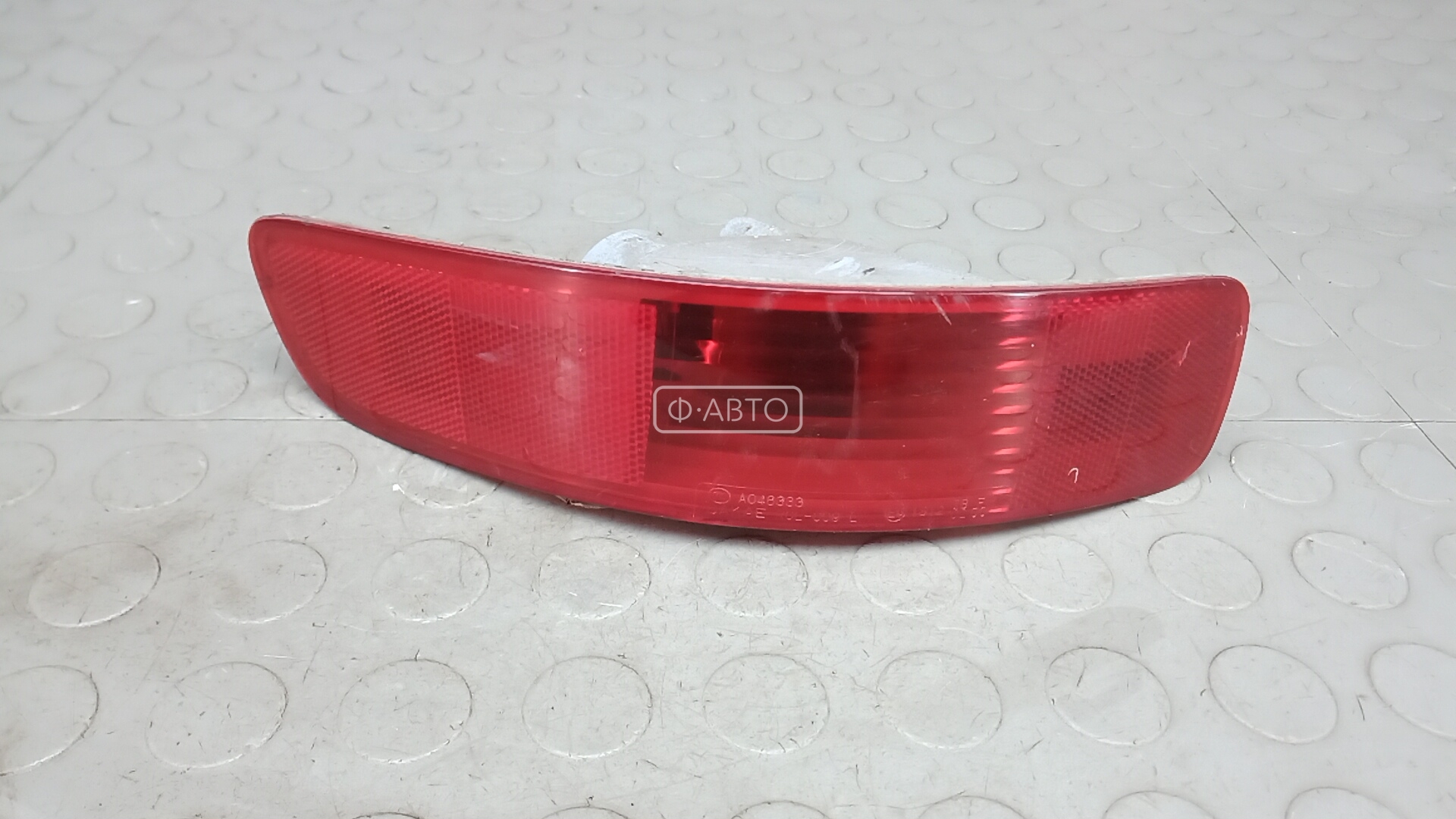 Фонарь бампера задний левый