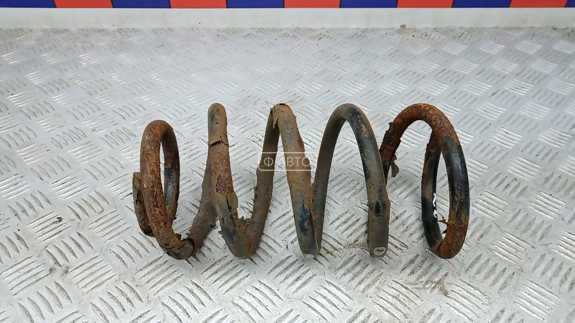 Пружина задняя