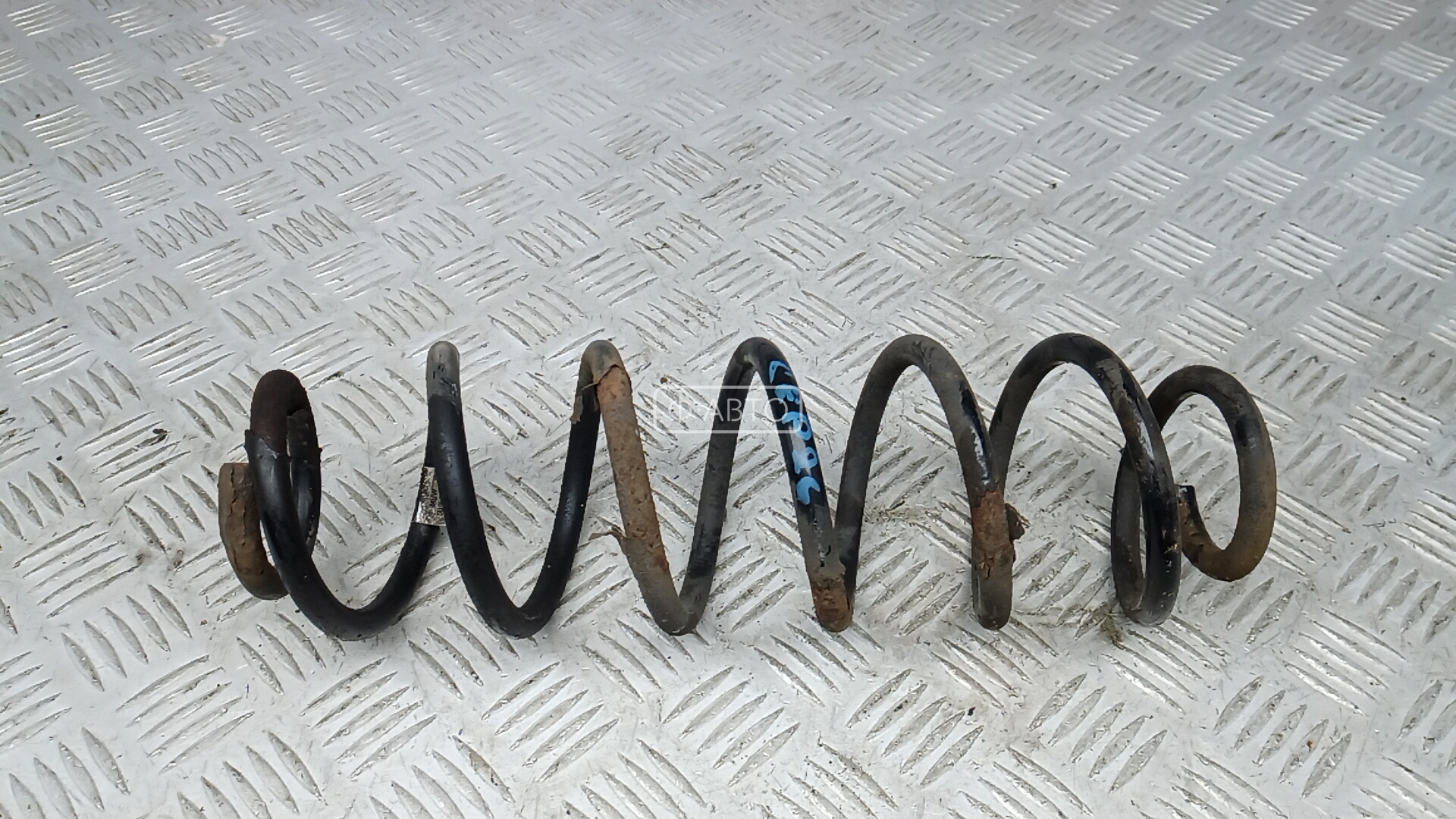 Пружина задняя