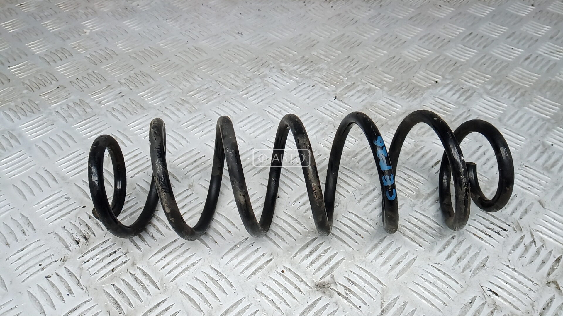 Пружина задняя