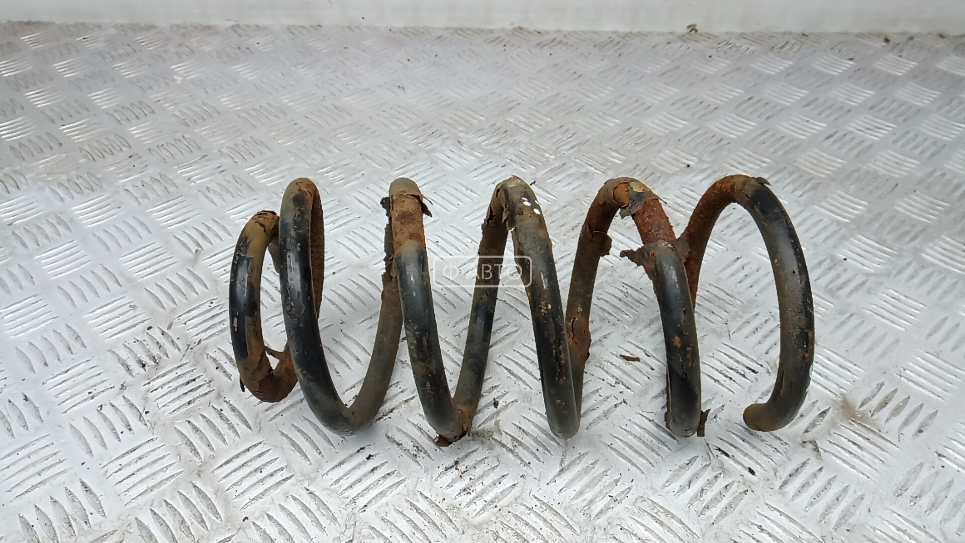 Пружина задняя