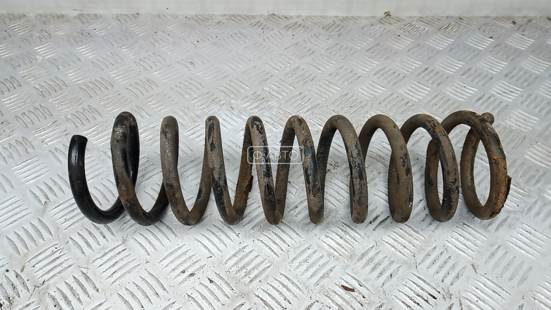 Пружина задняя