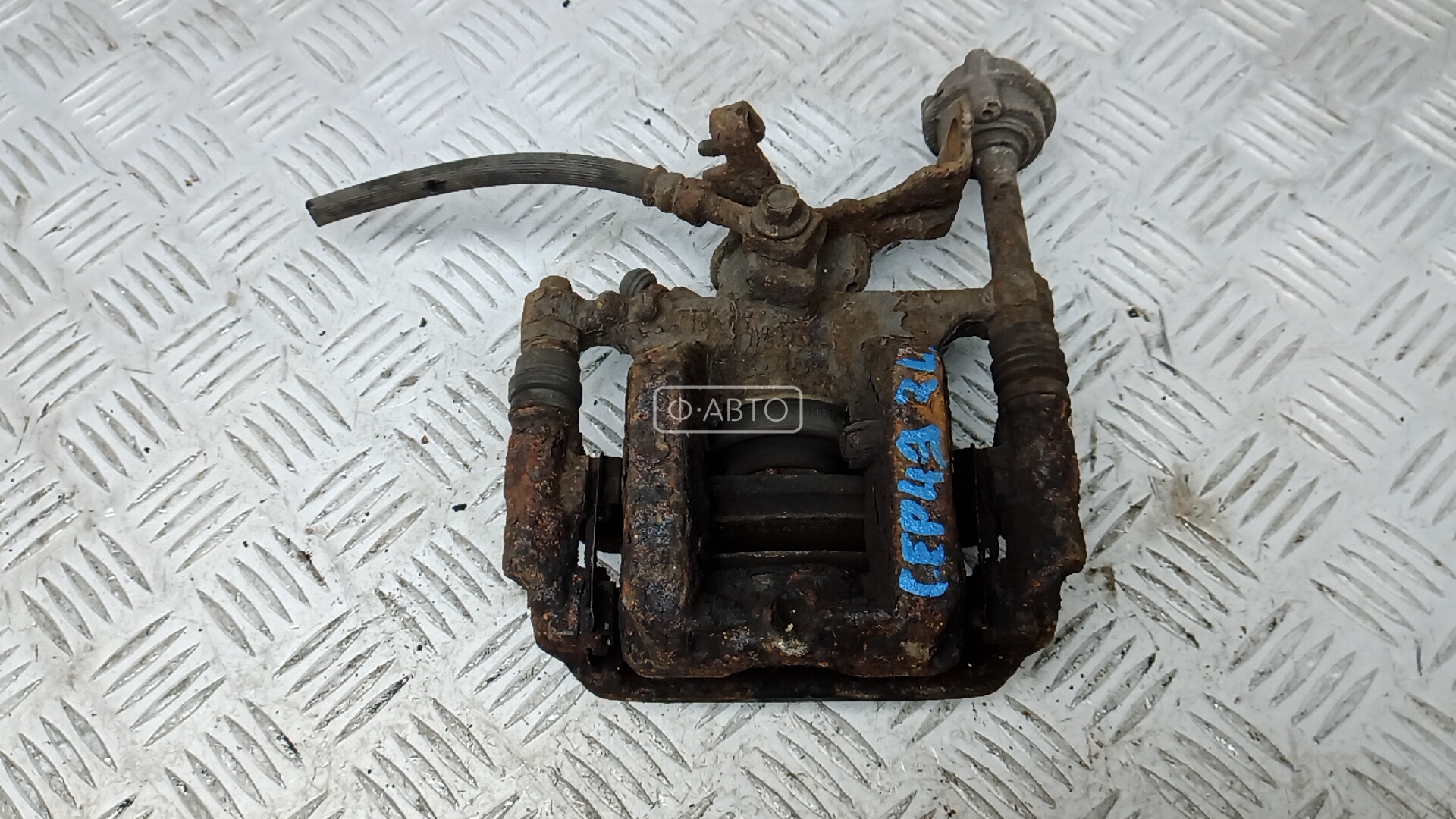 Суппорт тормозной задний левый