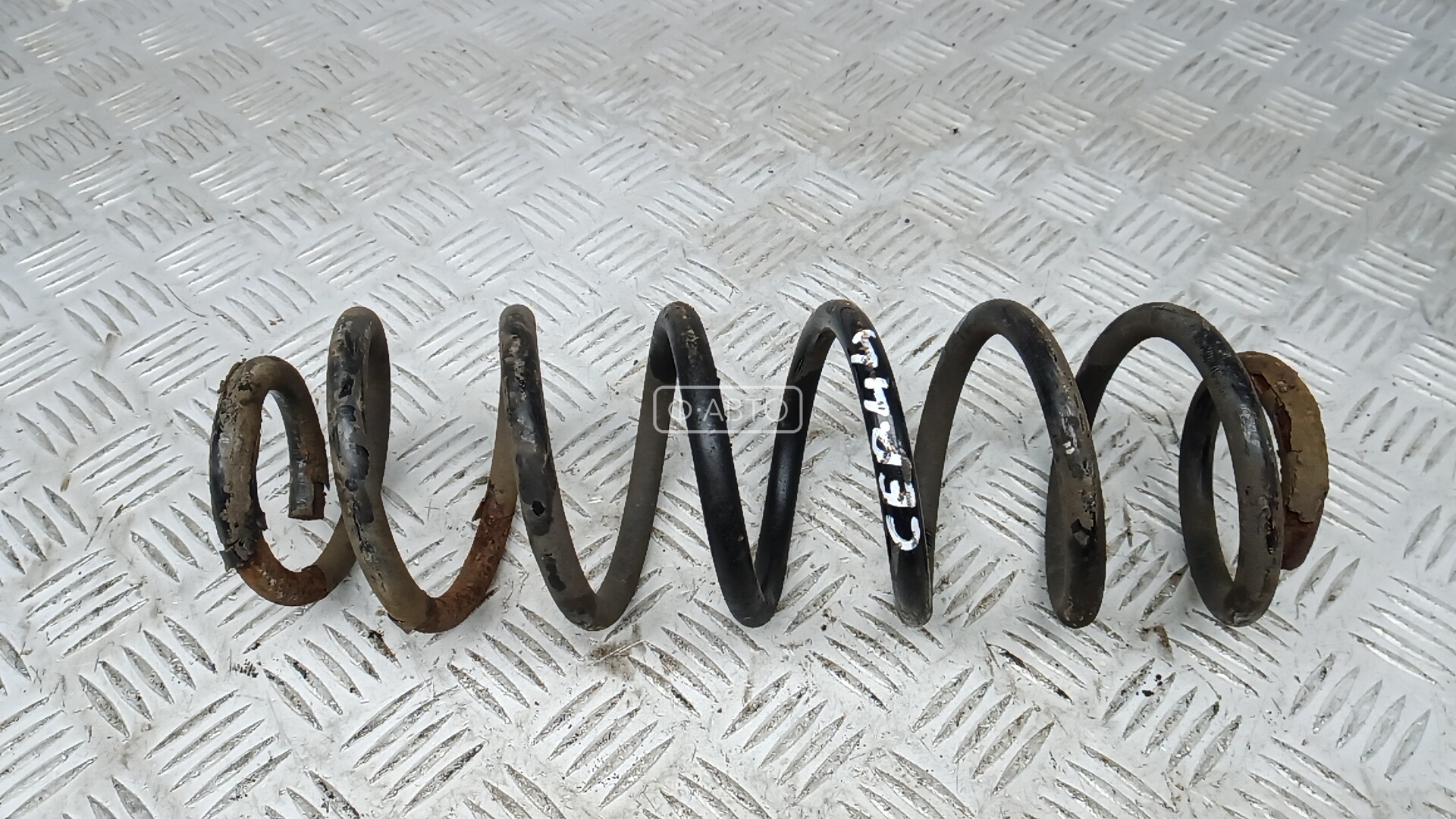 Пружина задняя