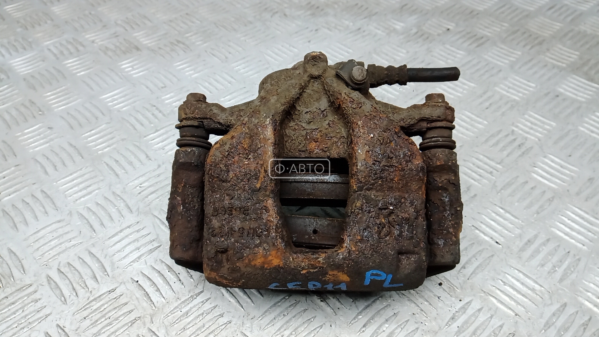 Суппорт тормозной передний левый