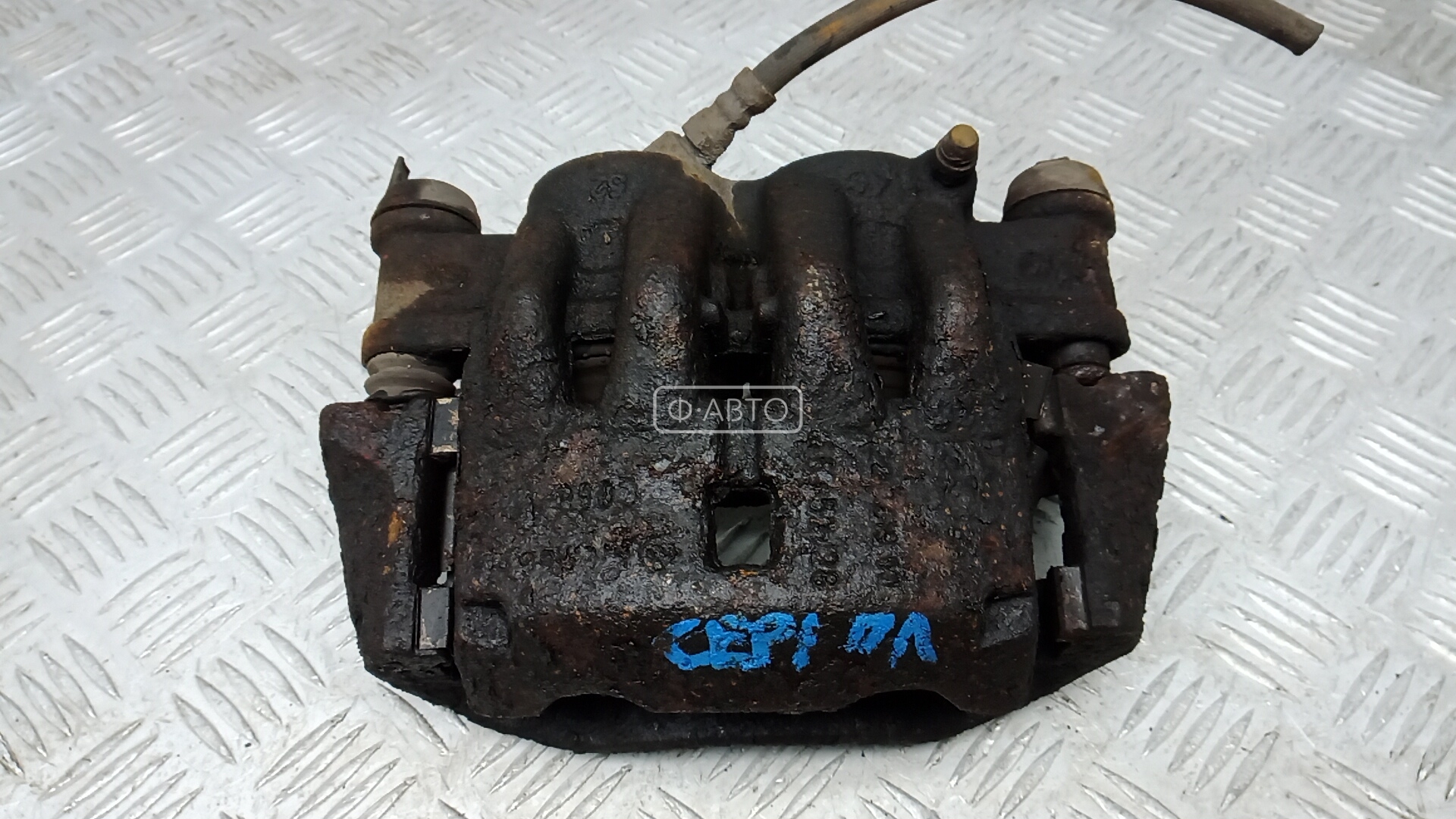 Суппорт тормозной передний левый