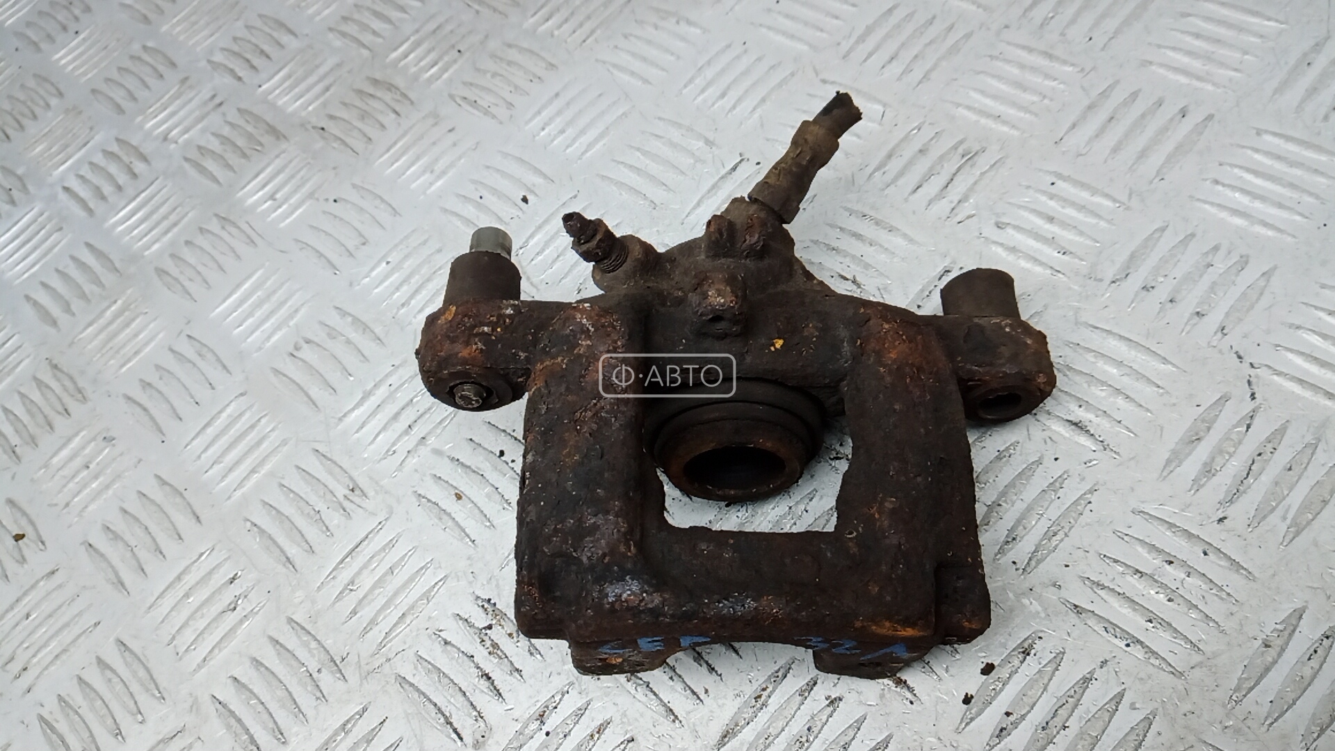 Суппорт тормозной задний левый