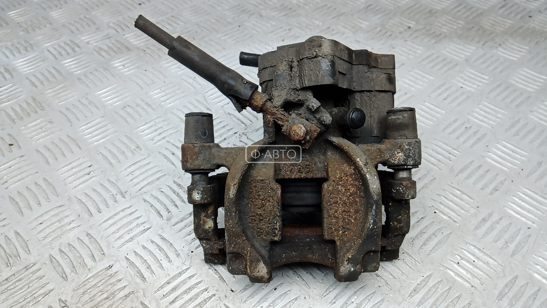 Суппорт тормозной задний левый