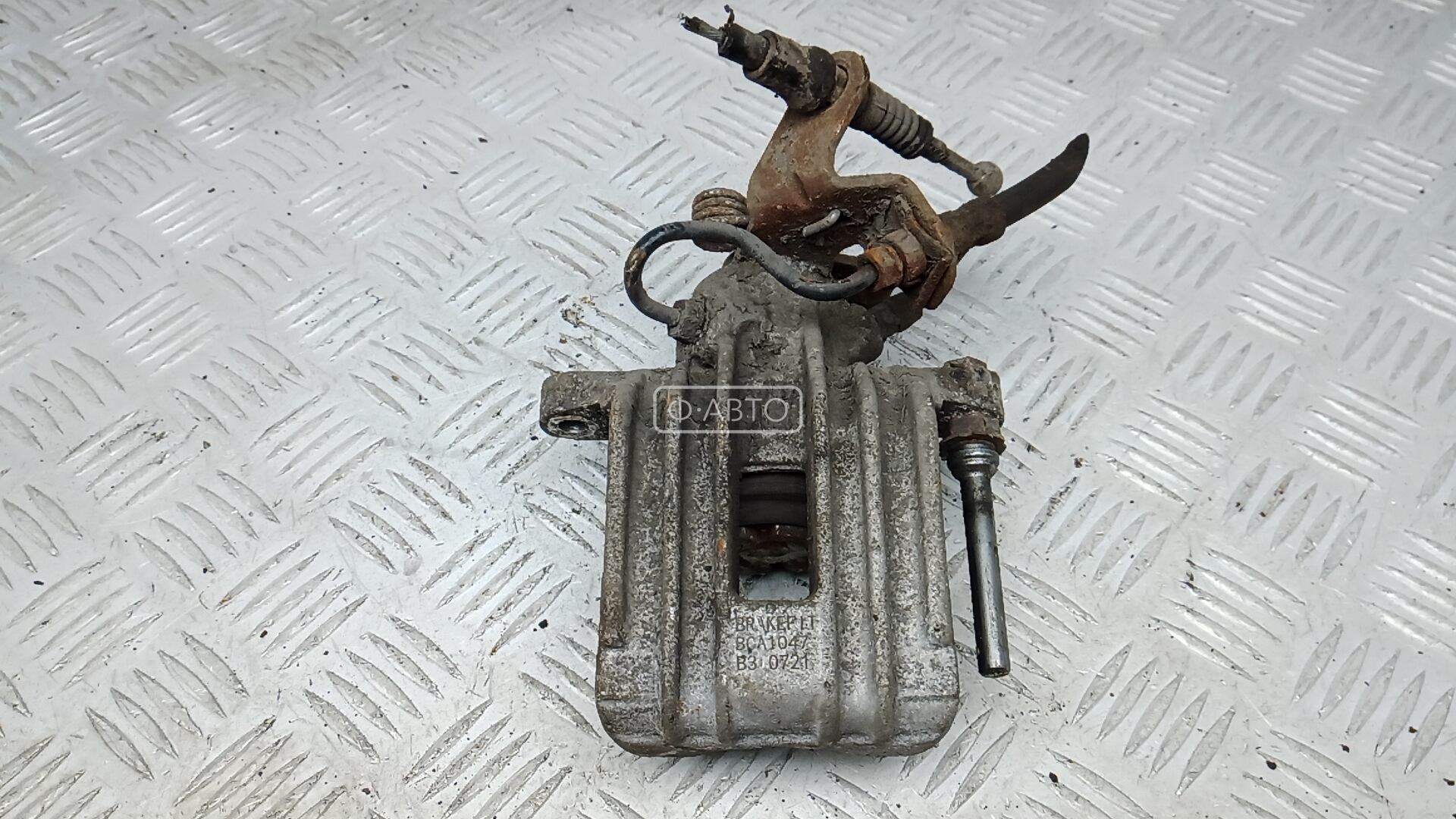 Суппорт тормозной задний левый