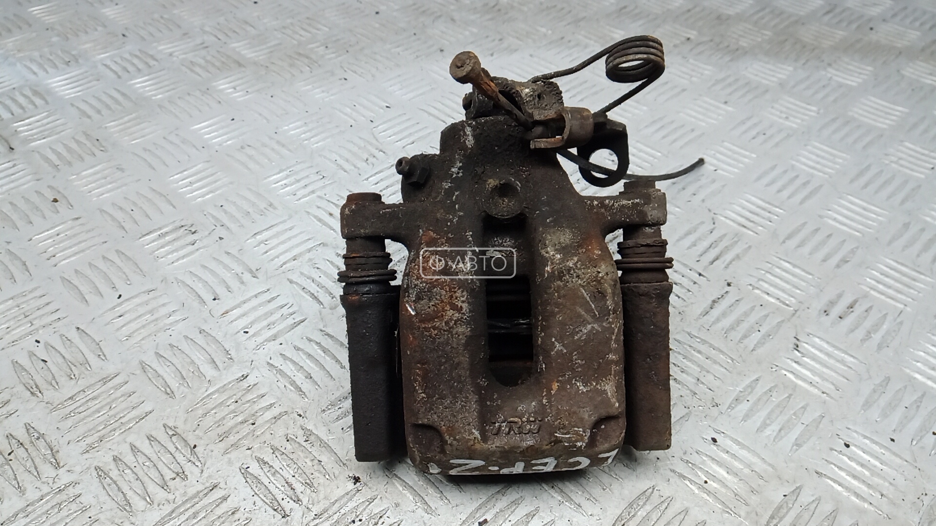 Суппорт тормозной задний левый