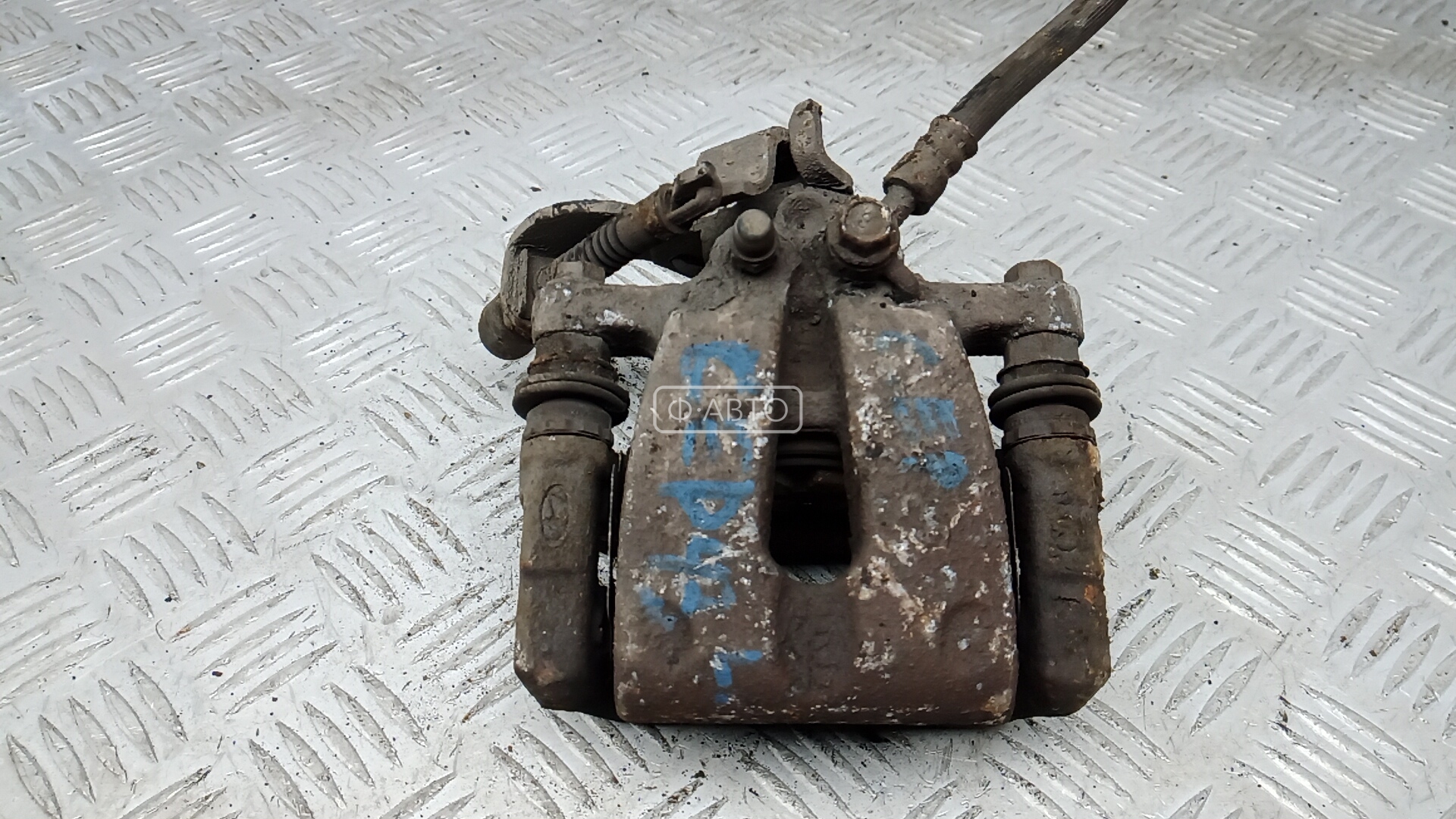 Суппорт тормозной задний левый