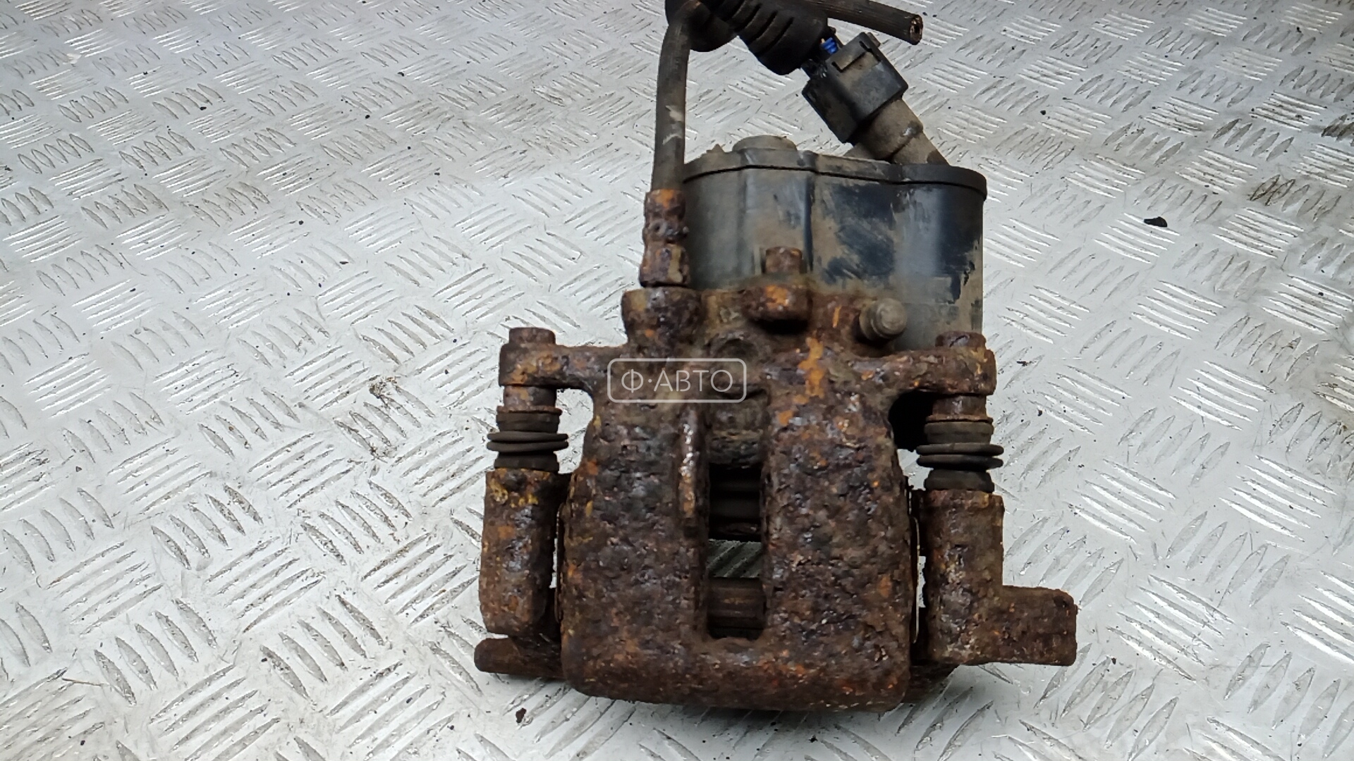 Суппорт тормозной задний левый