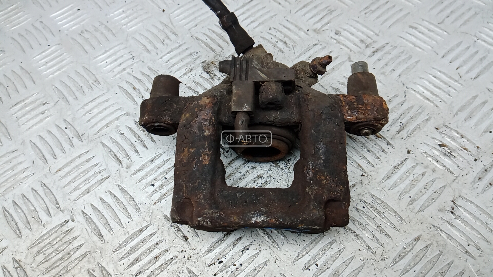 Суппорт тормозной задний правый