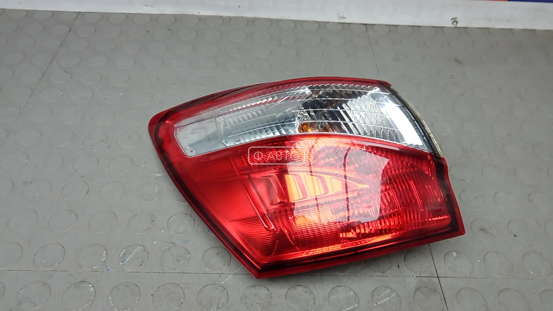 Фонарь задний левый