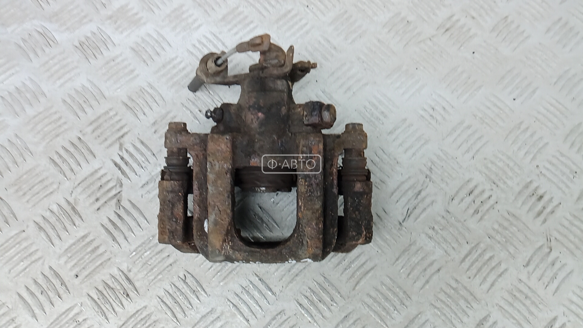 Суппорт тормозной задний левый