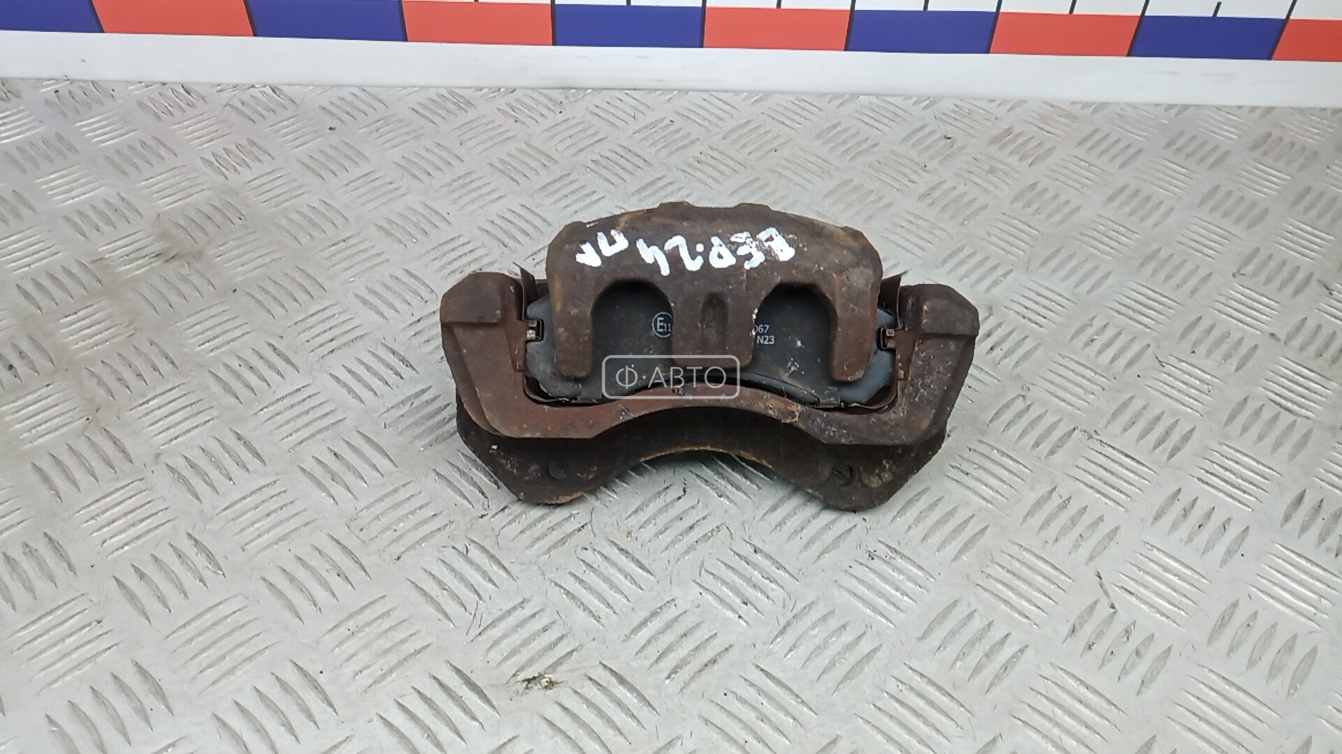 Суппорт тормозной передний левый