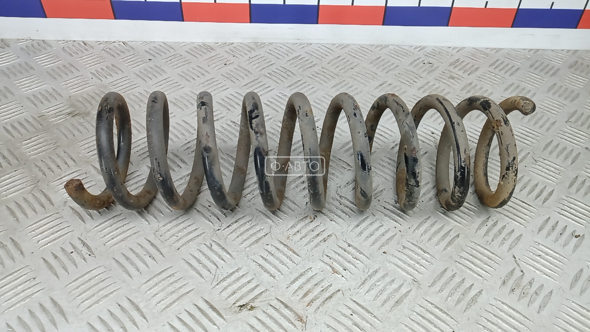 Пружина задняя