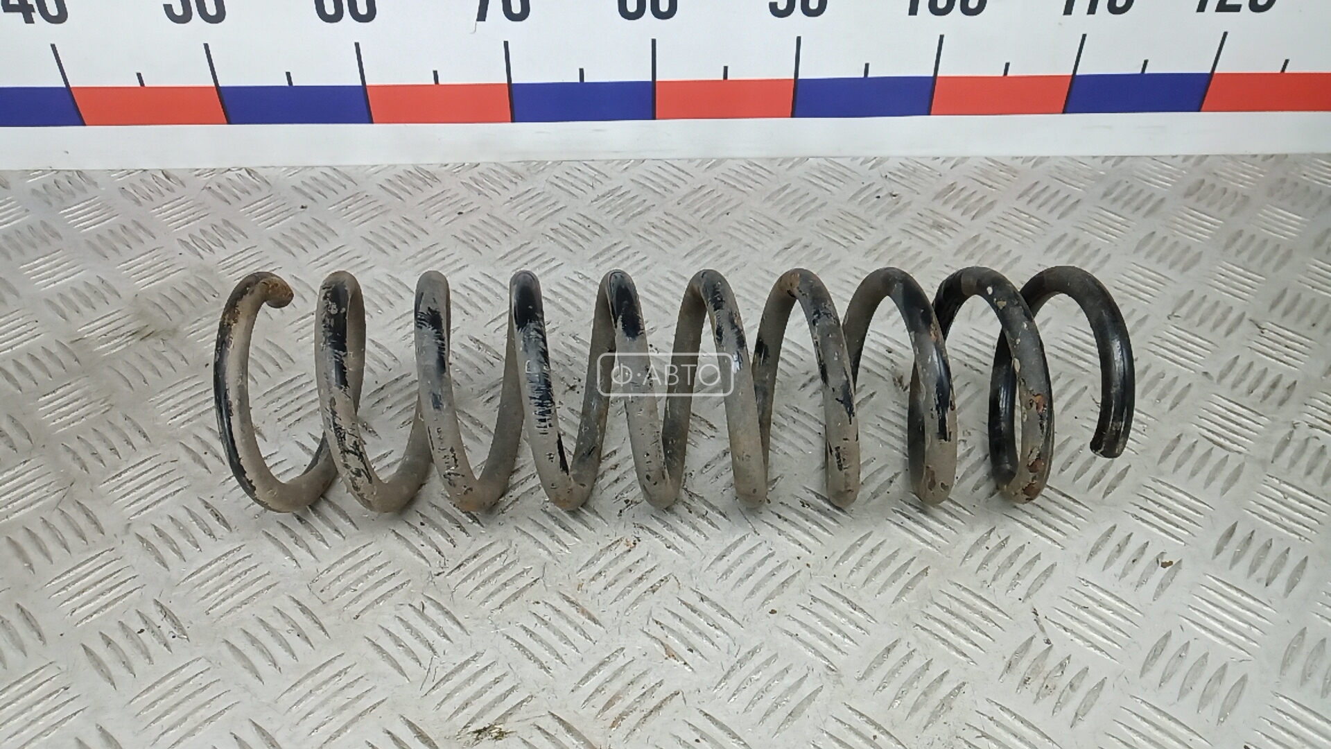 Пружина задняя