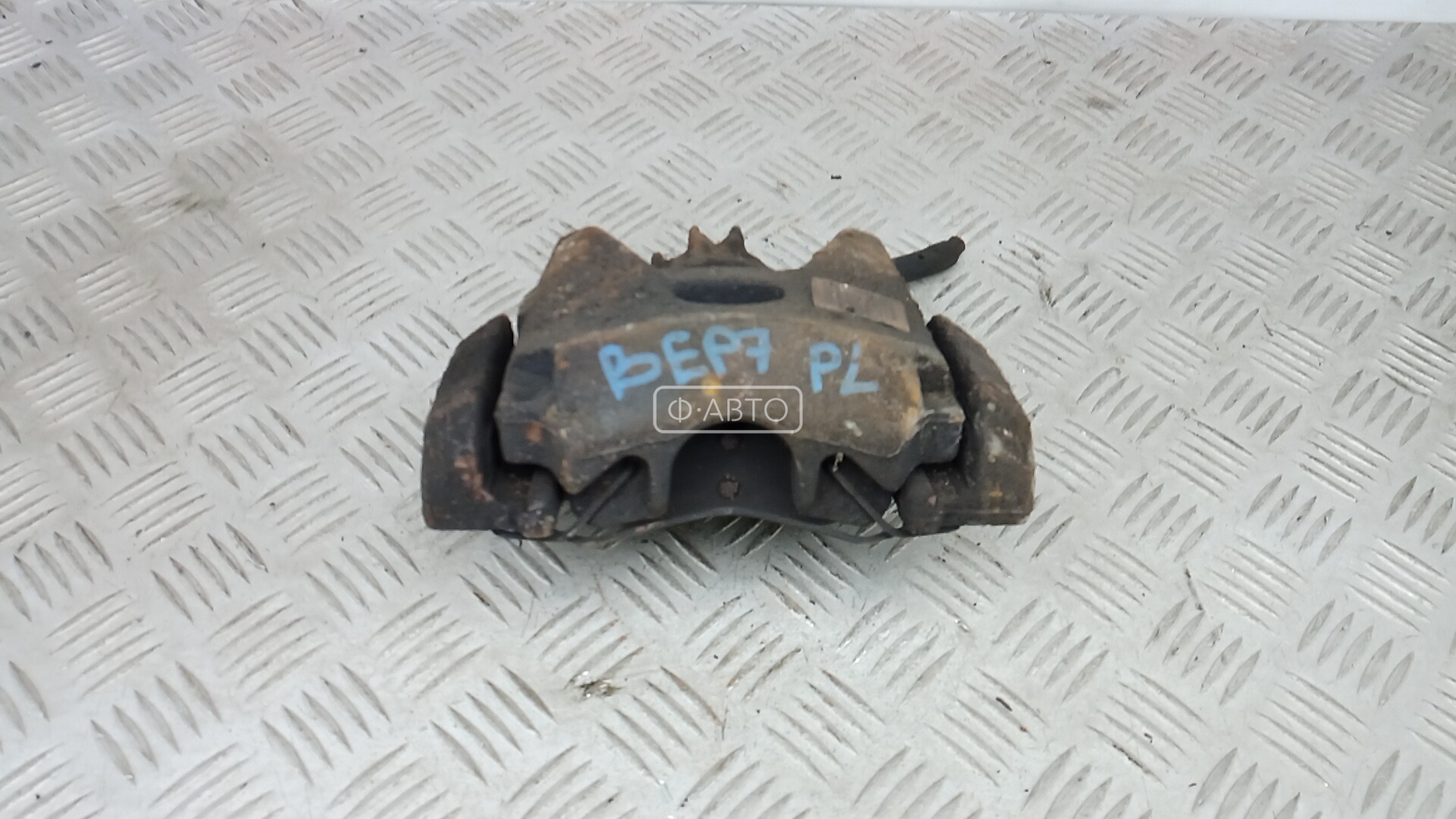 Суппорт тормозной передний левый