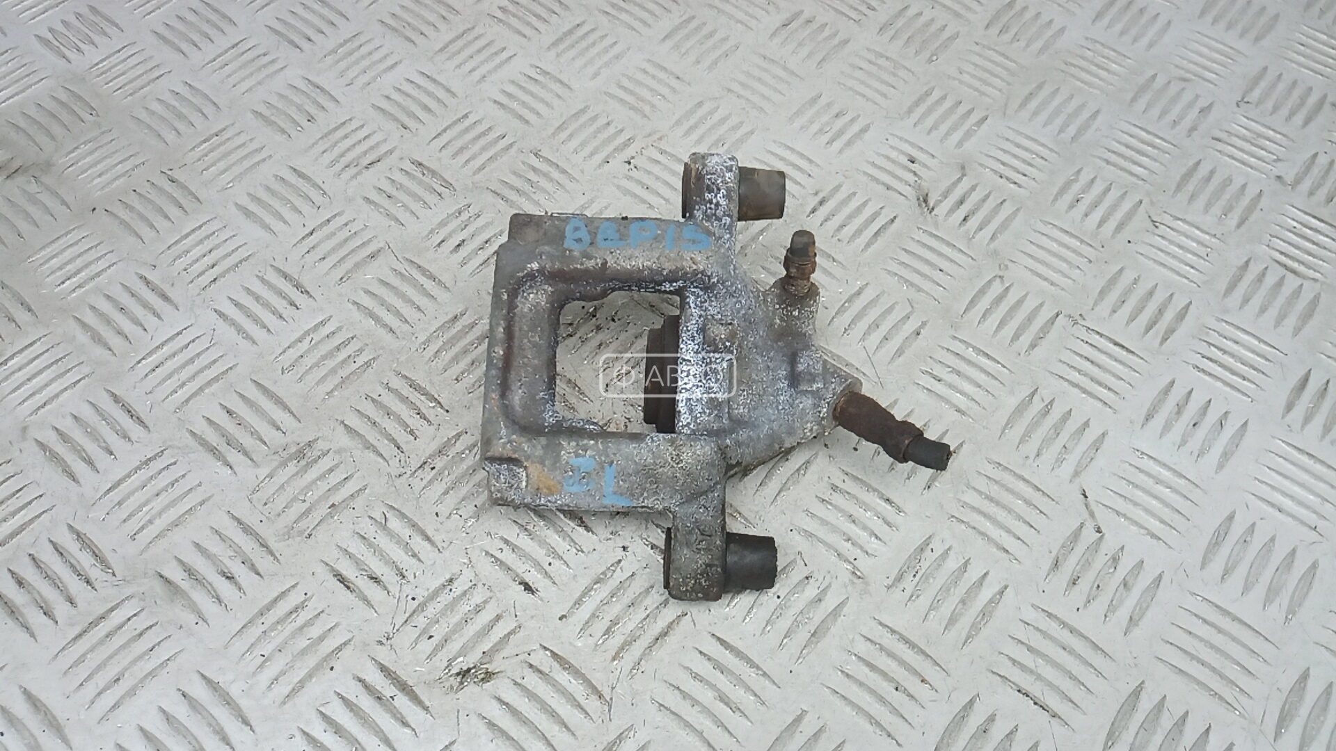 Суппорт тормозной задний левый