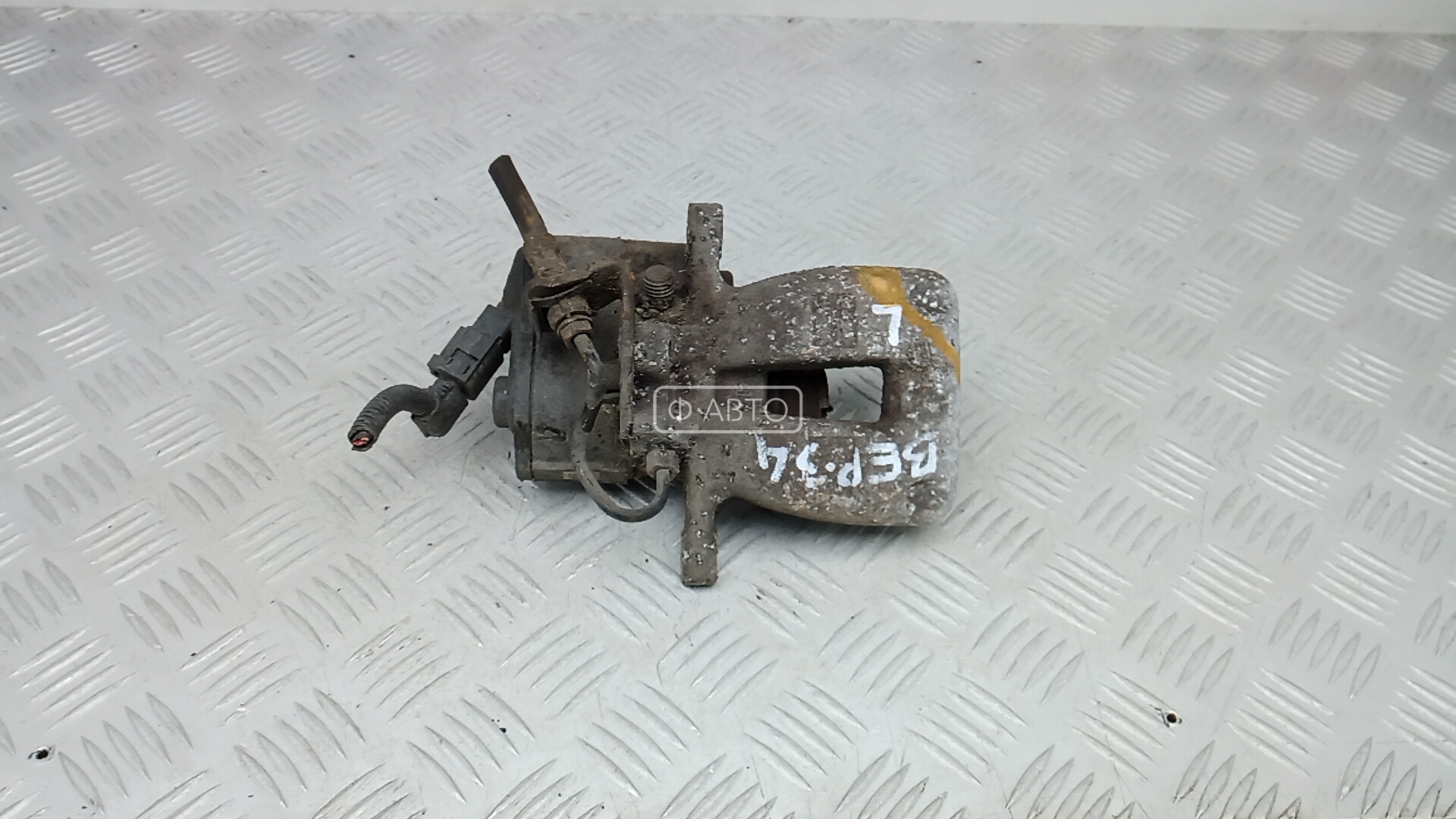 Суппорт тормозной задний левый