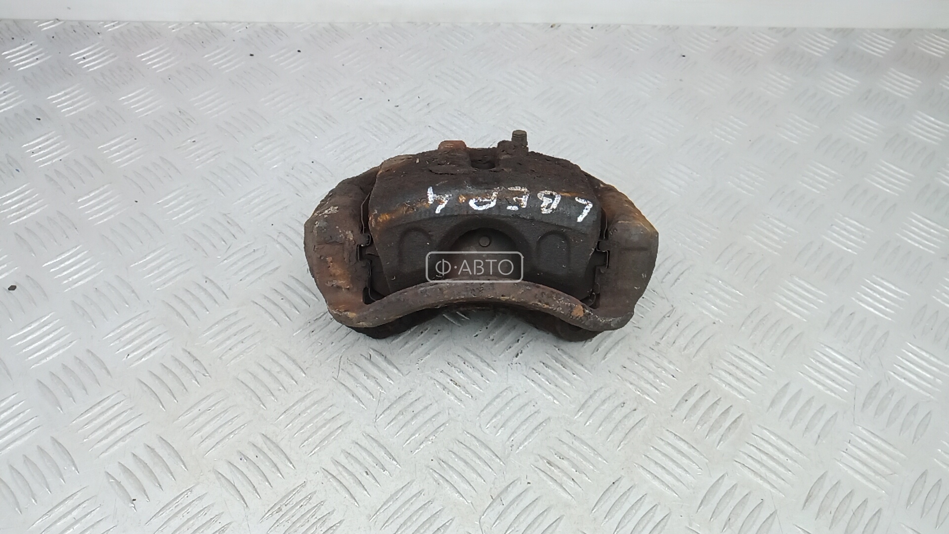 Суппорт тормозной передний левый