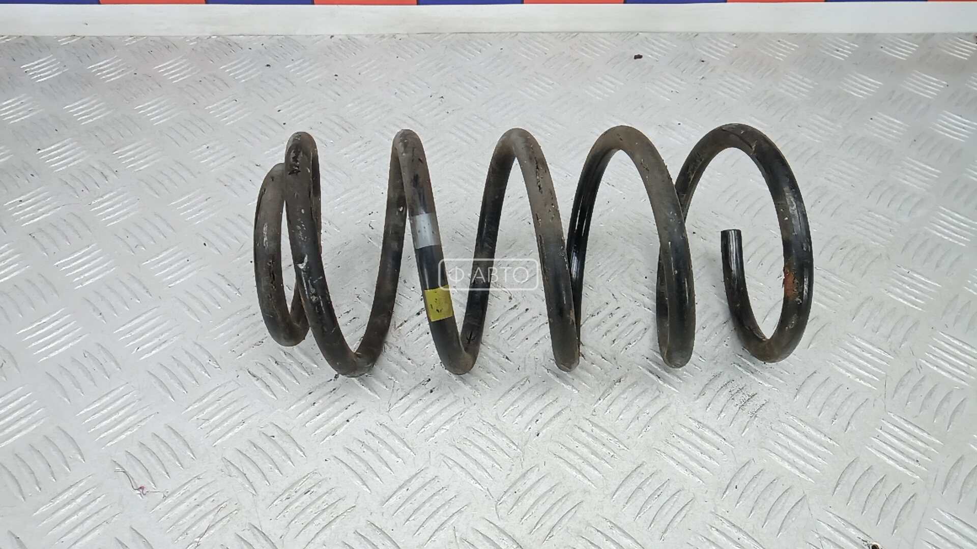 Пружина задняя