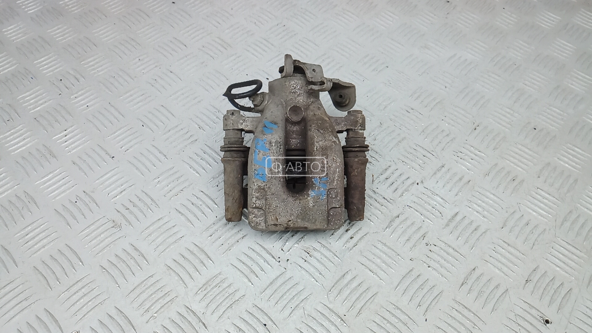 Суппорт тормозной задний левый