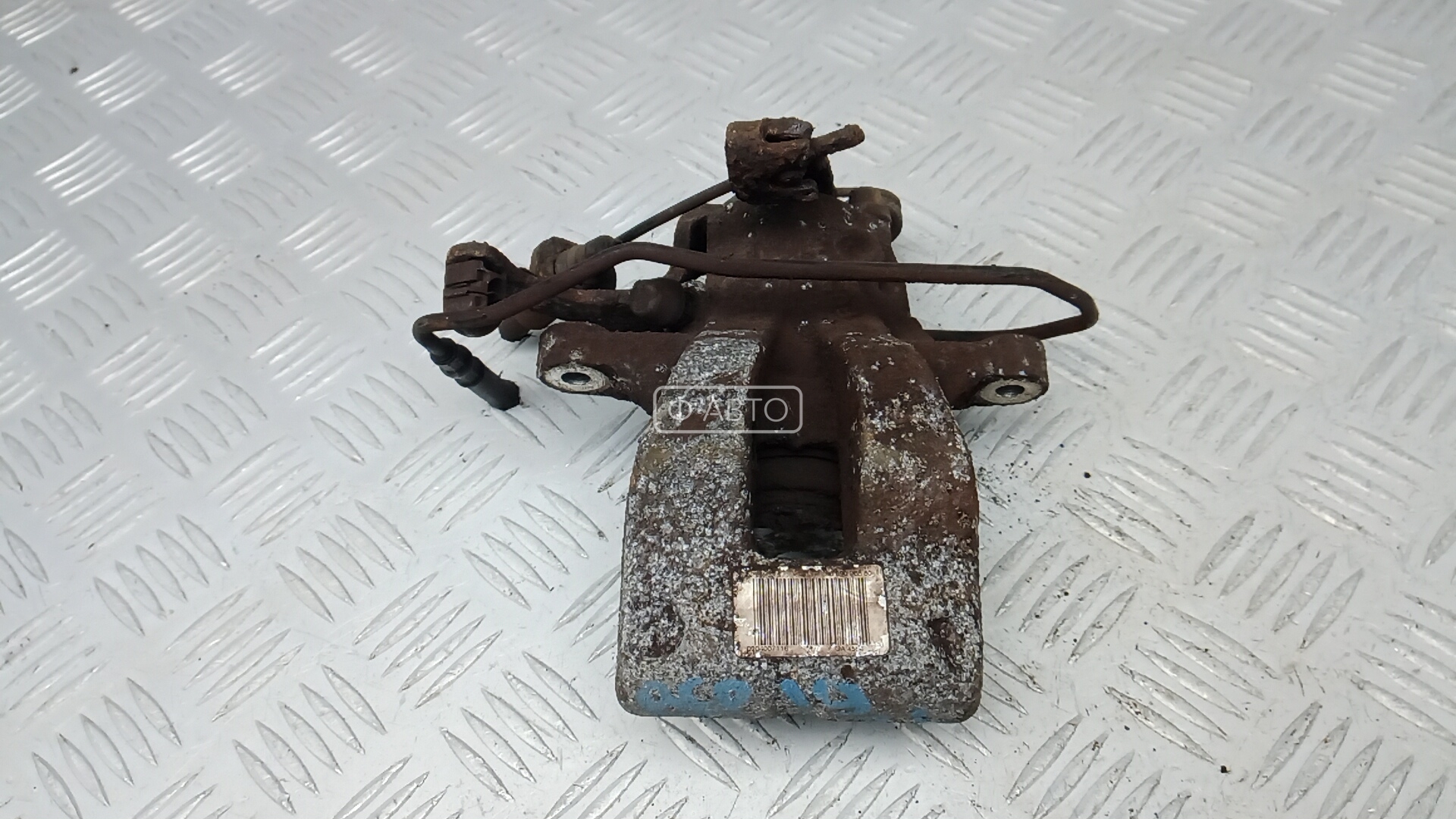 Суппорт тормозной задний левый