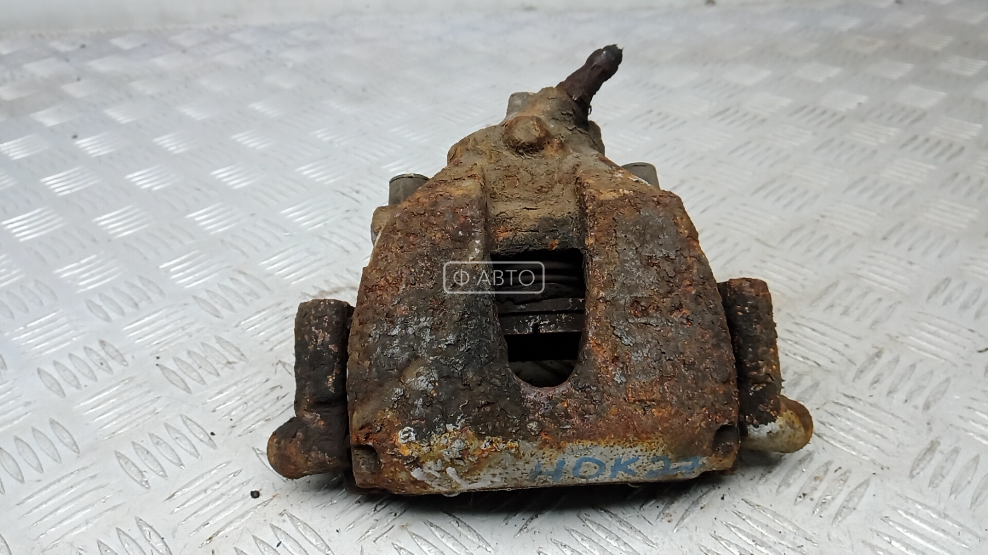 Суппорт тормозной передний левый