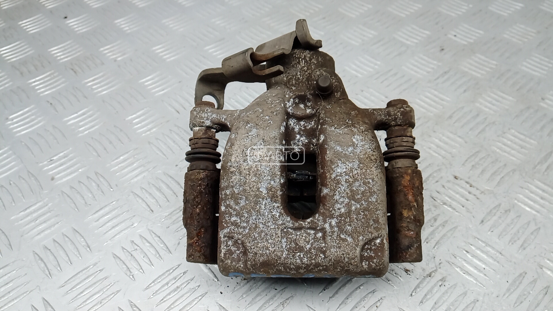 Суппорт тормозной задний правый