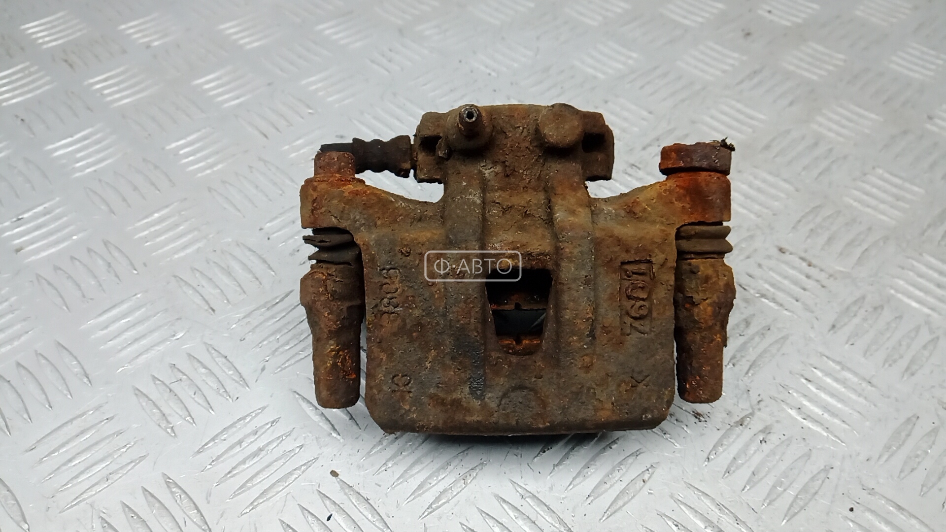 Суппорт тормозной задний левый