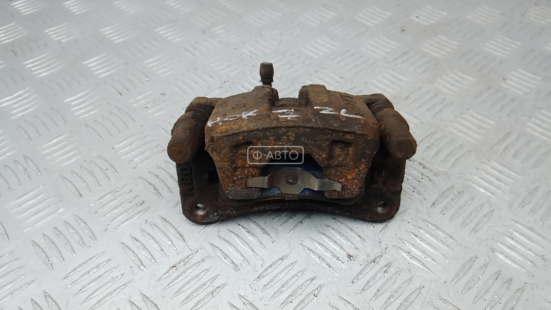 Суппорт тормозной задний левый