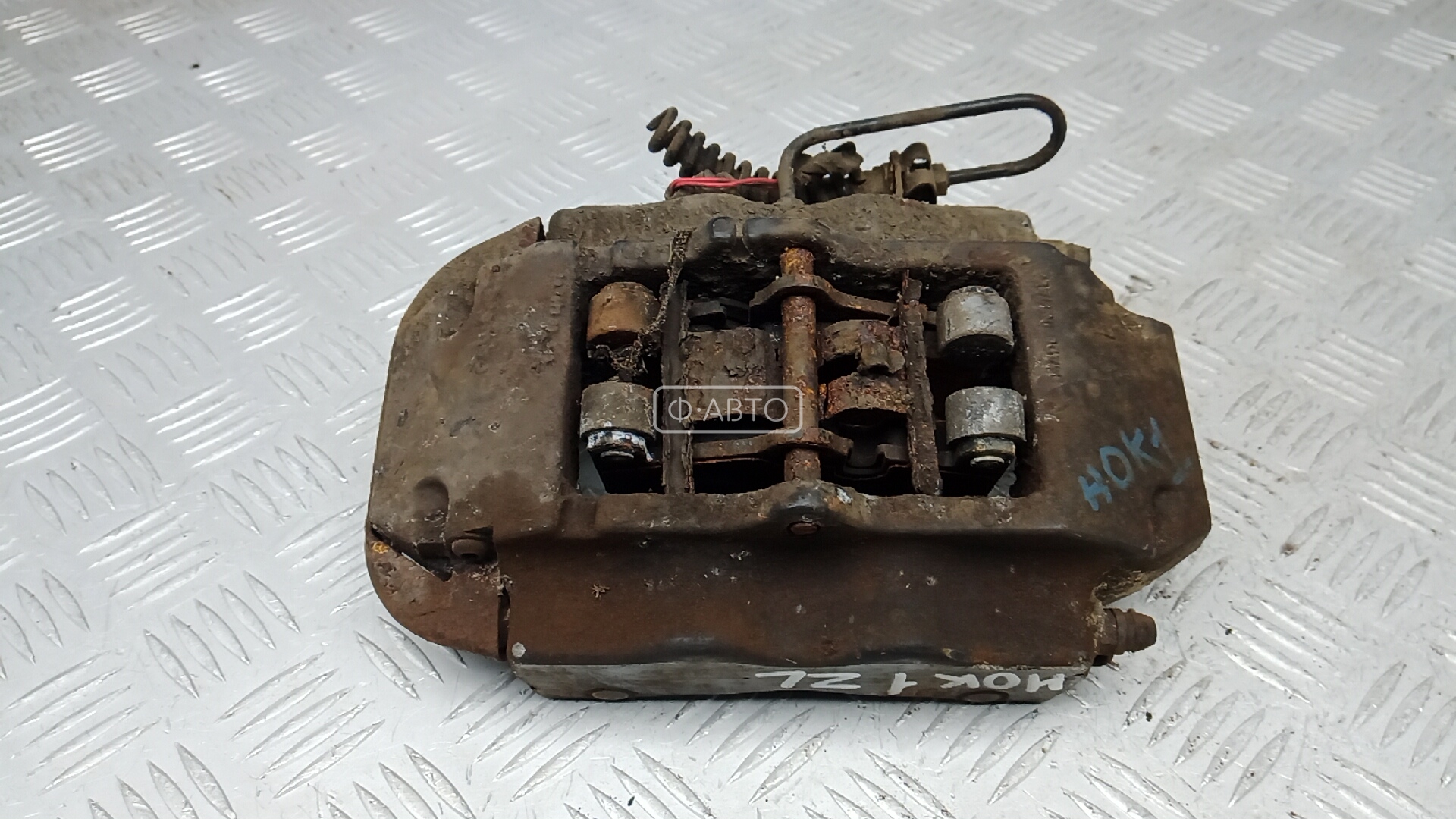 Суппорт тормозной задний левый