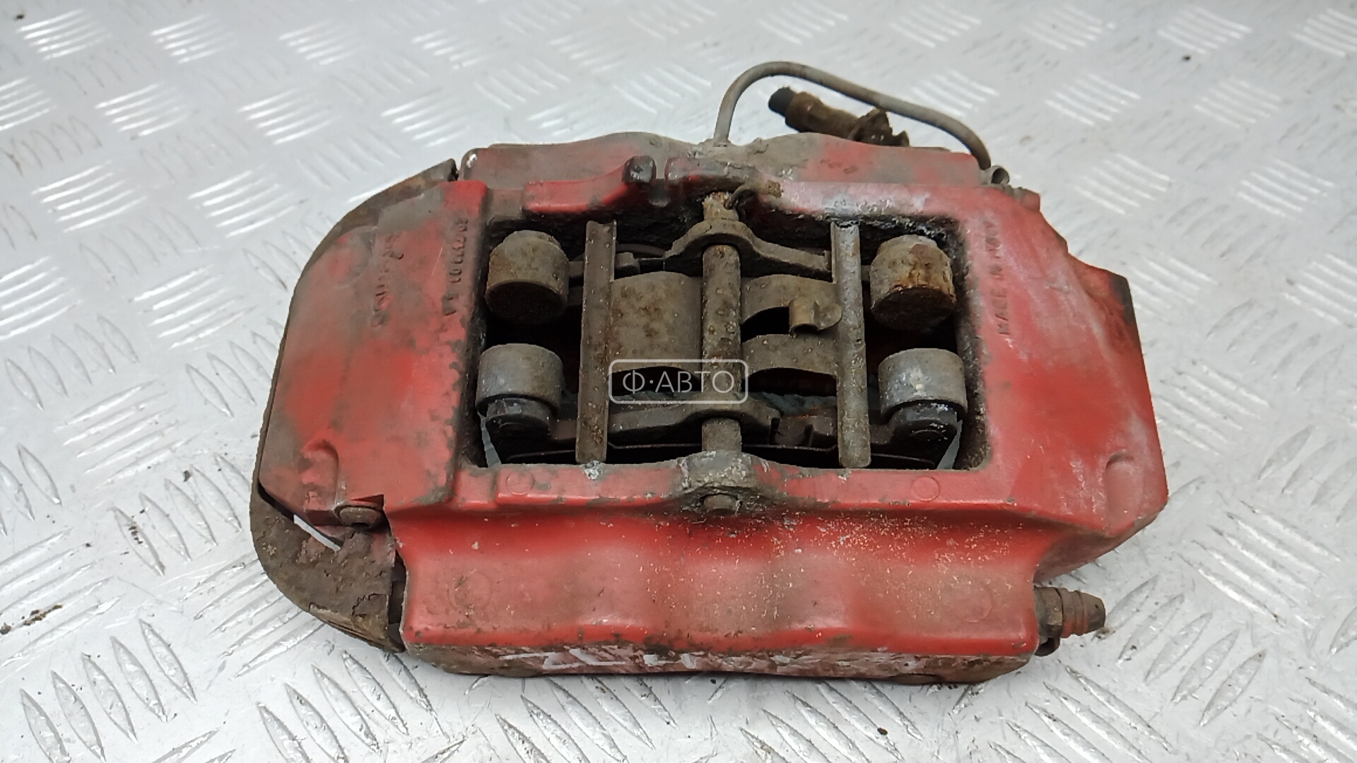 Суппорт тормозной задний левый