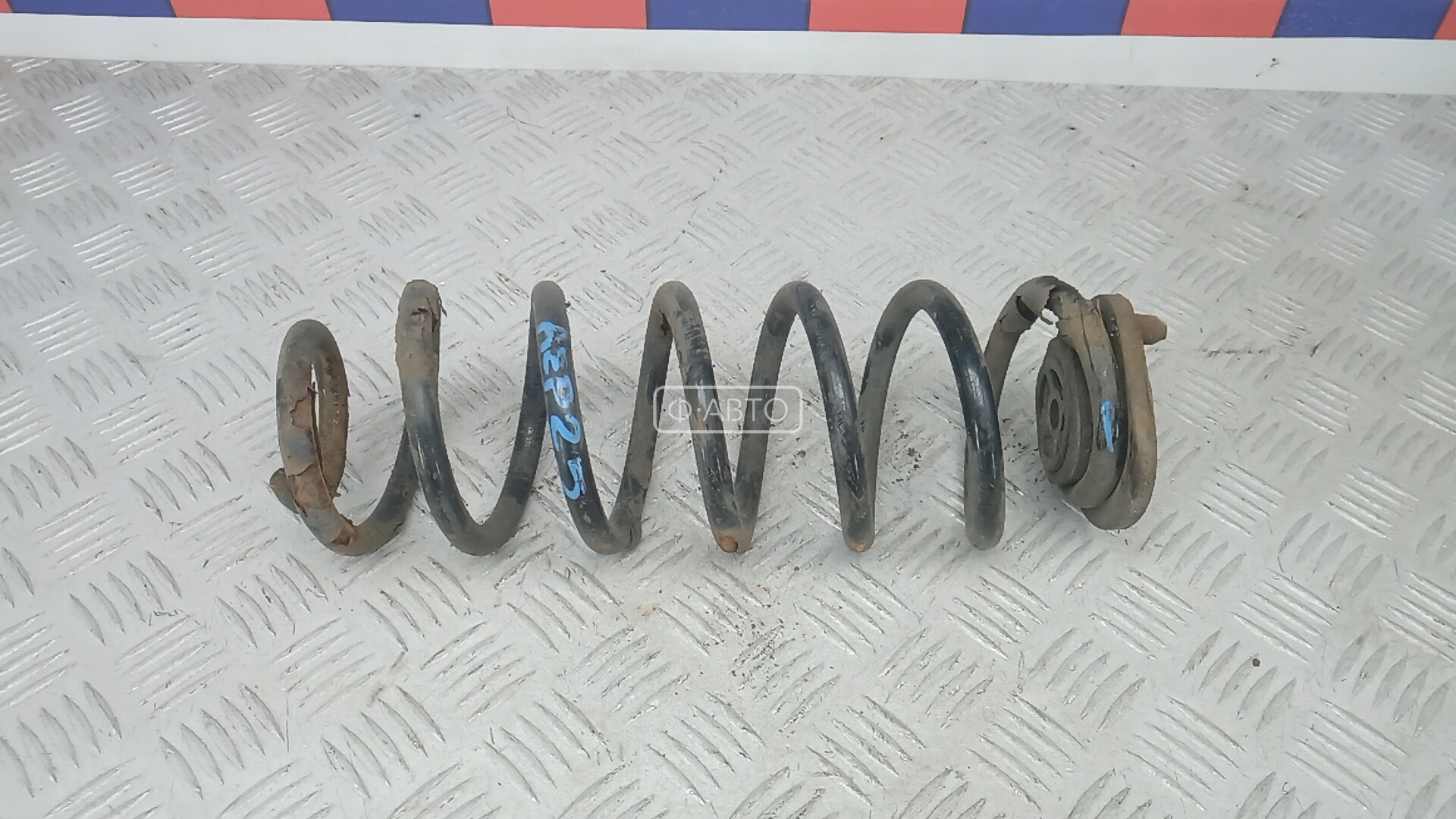 Пружина задняя