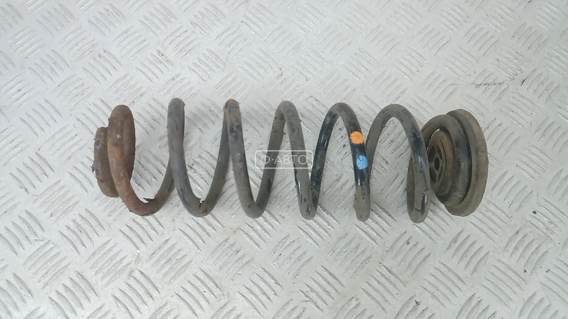 Пружина задняя