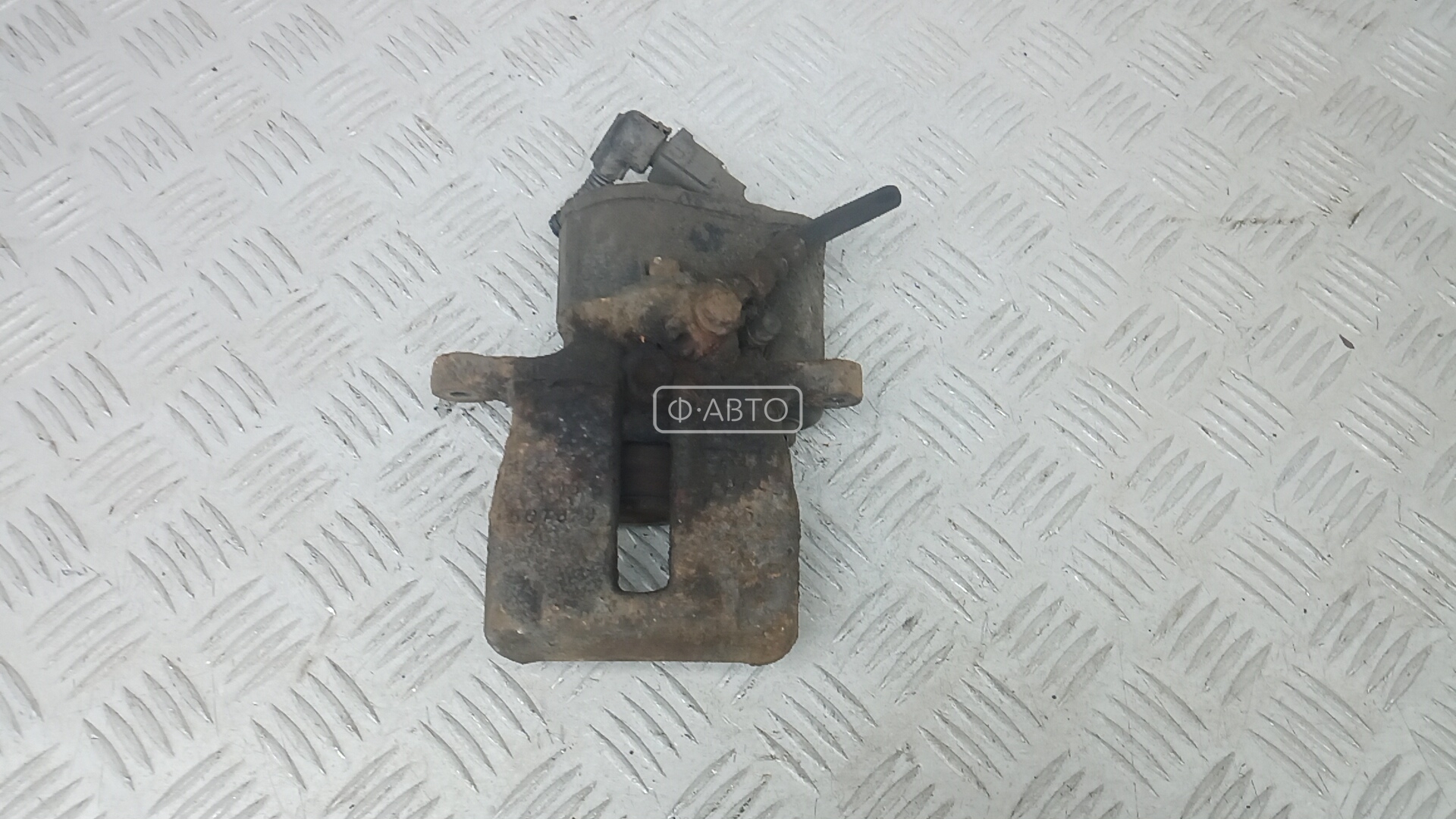 Суппорт тормозной задний левый