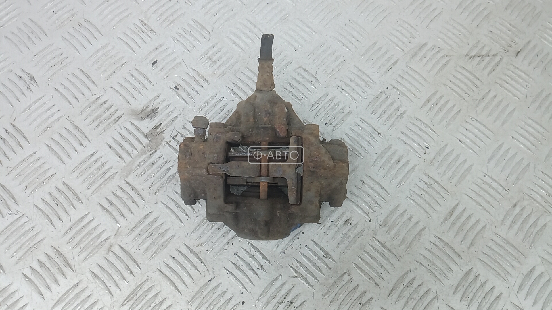 Суппорт тормозной задний левый