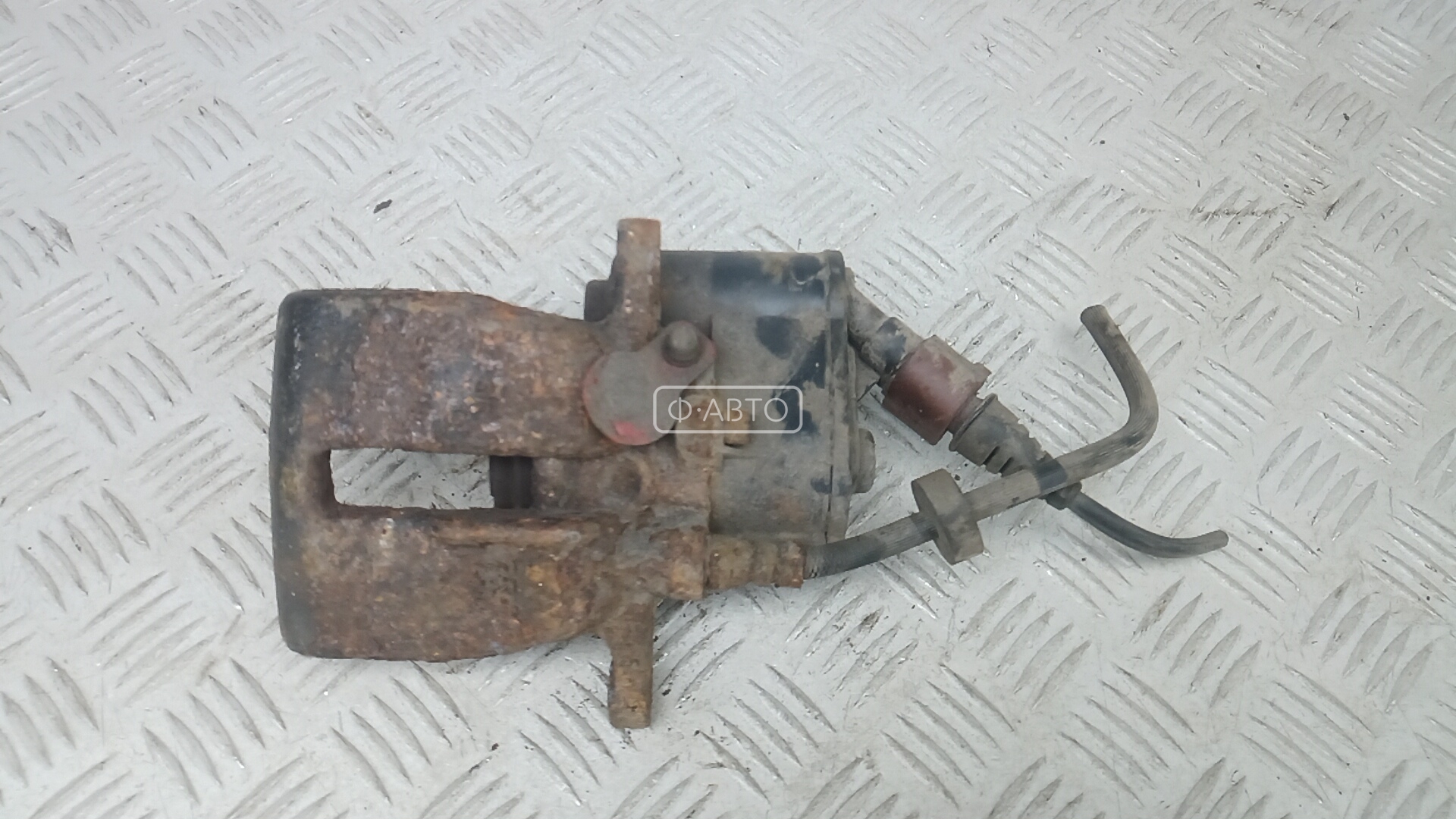 Суппорт тормозной задний левый