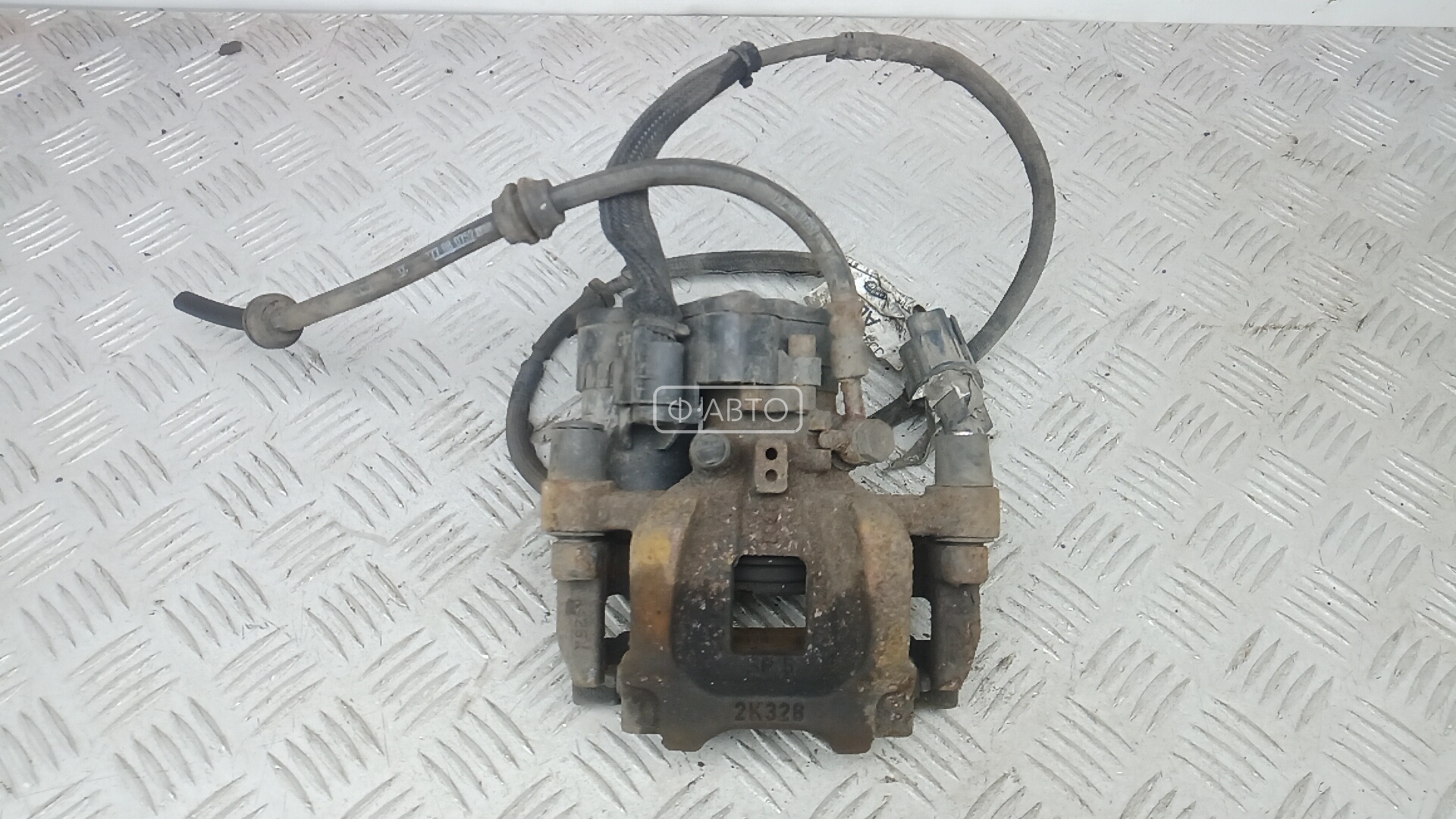 Суппорт тормозной задний левый