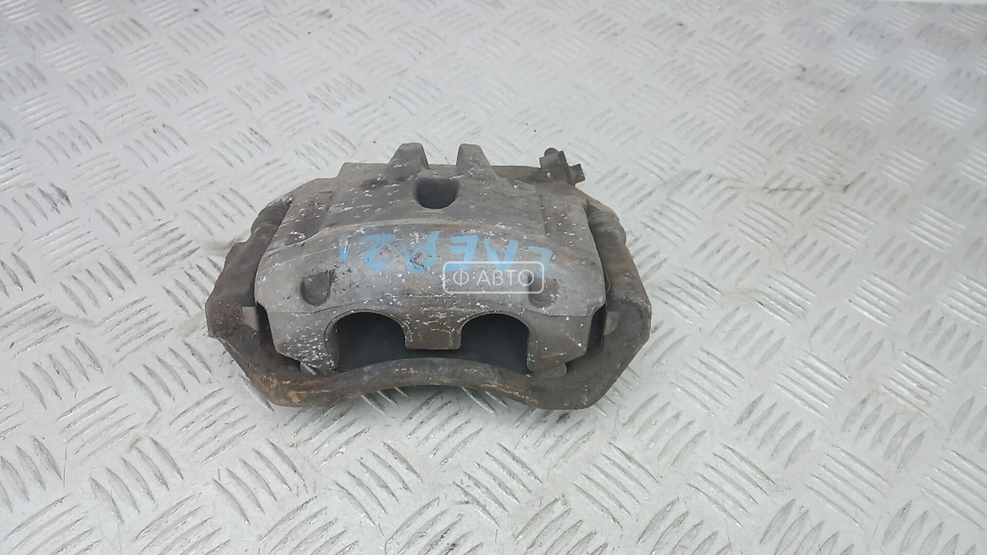 Суппорт тормозной передний левый