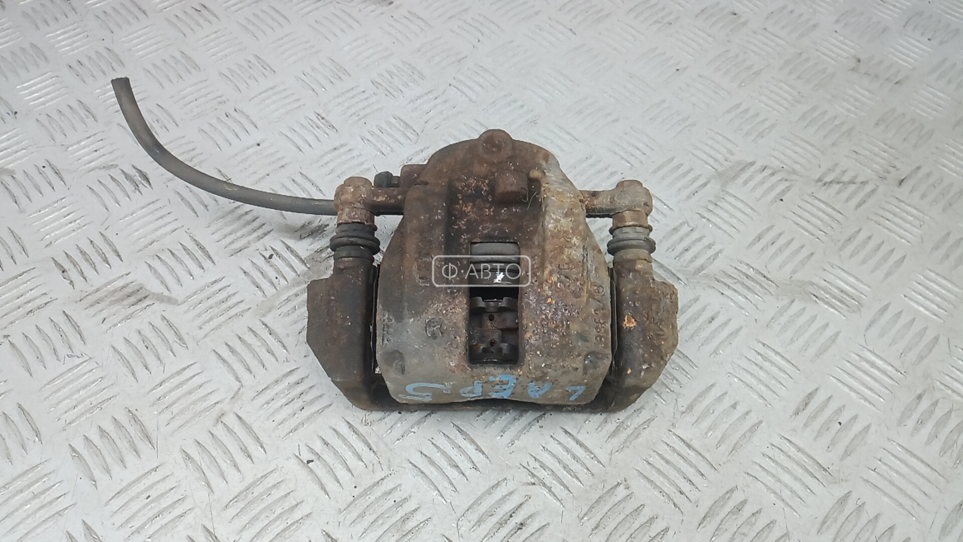 Суппорт тормозной передний левый