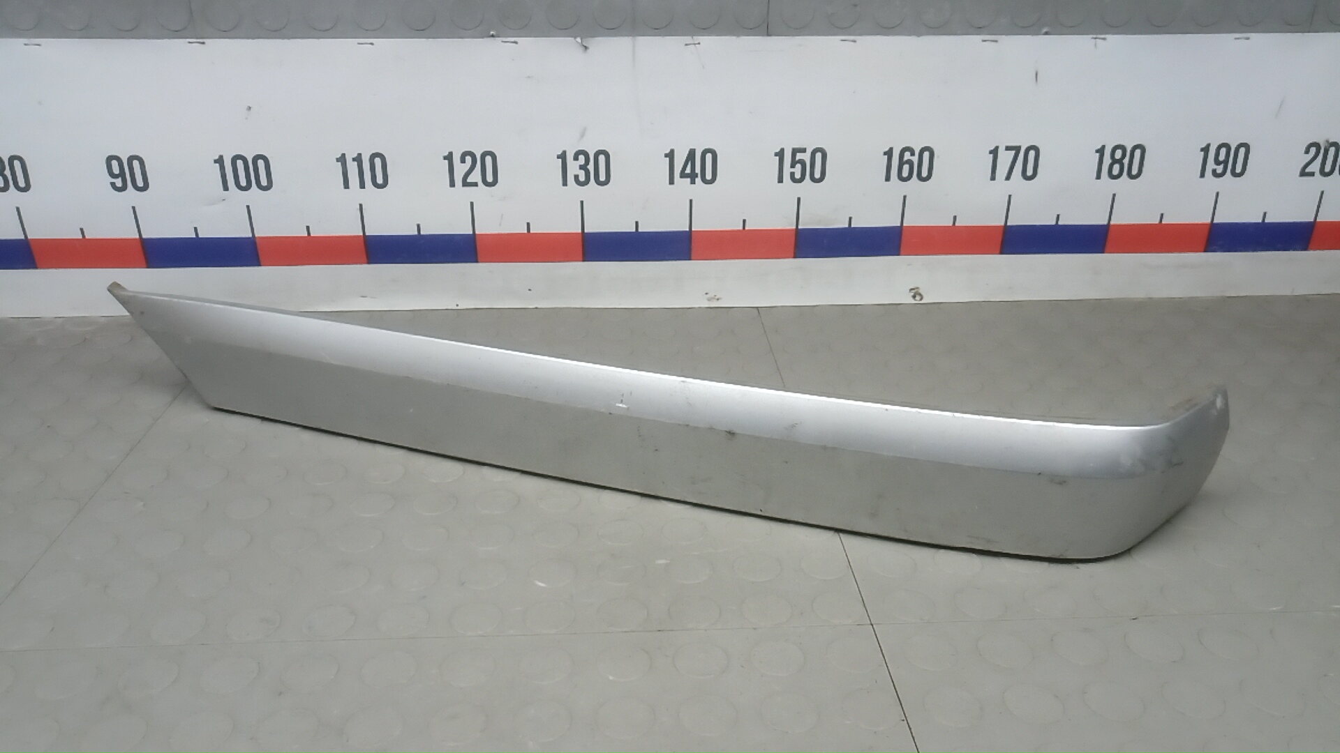 Ус под фонарь левый OPEL OMEGA B