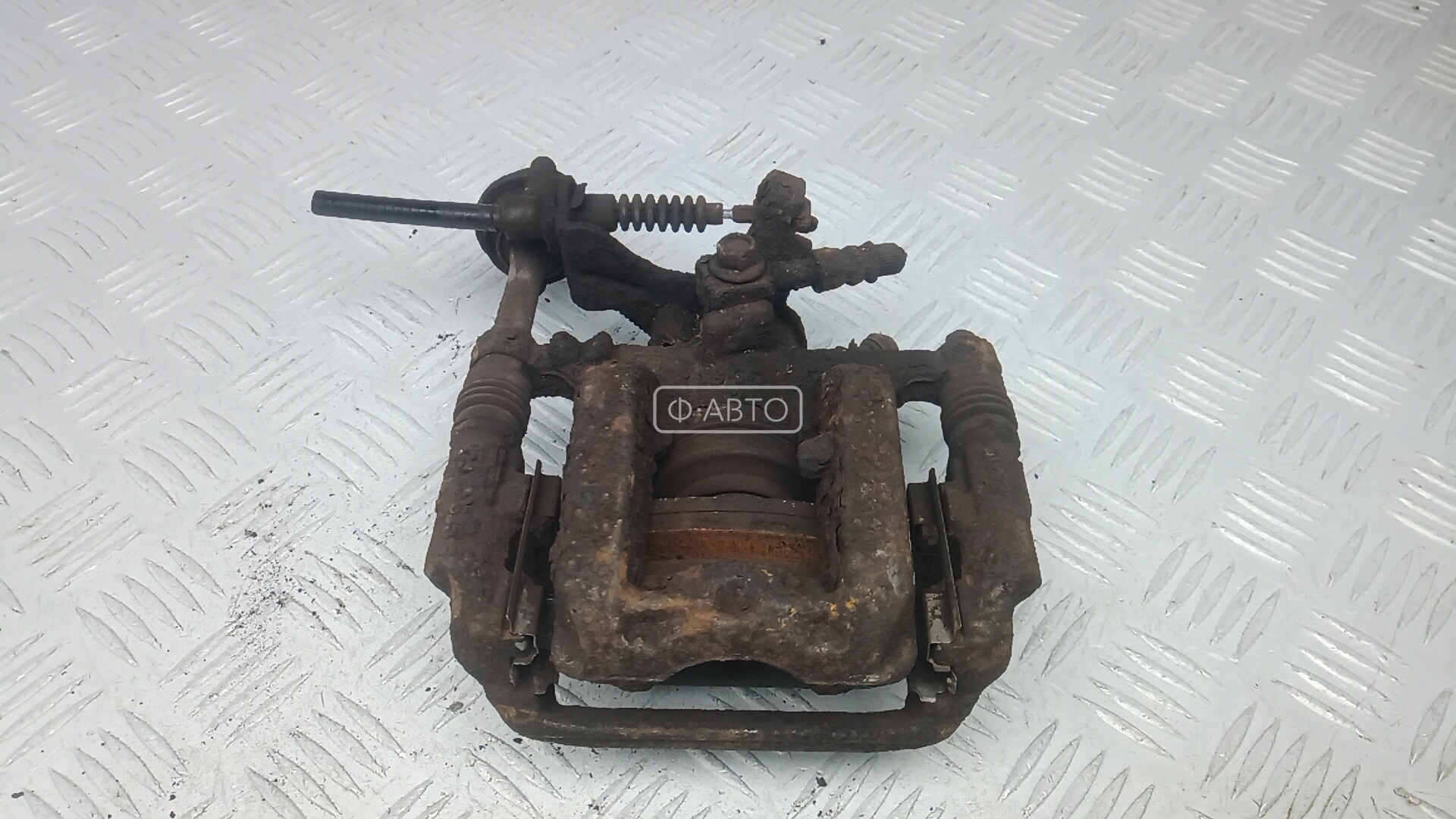 Суппорт тормозной задний правый