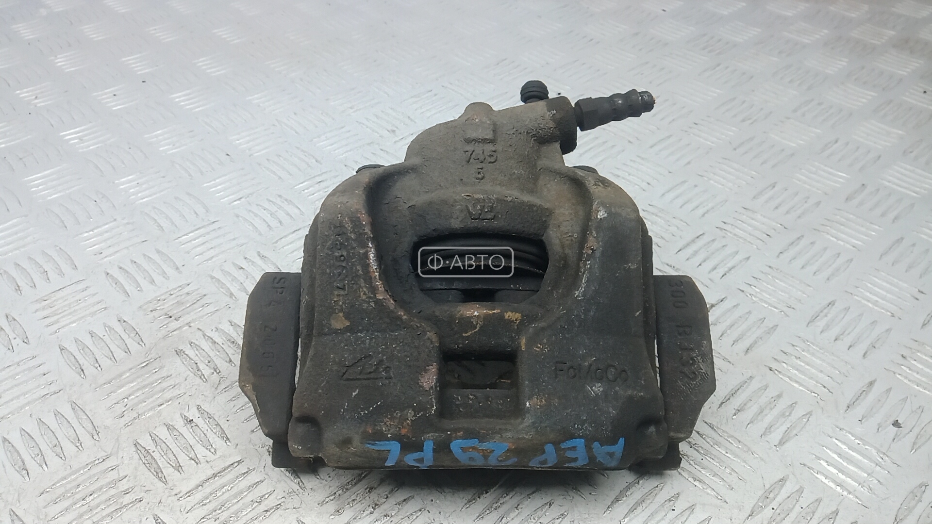 Суппорт тормозной передний левый