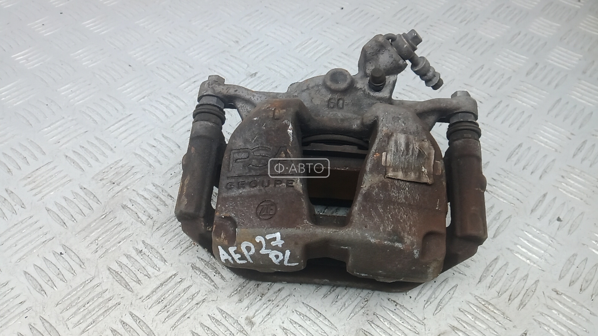 Суппорт тормозной передний левый