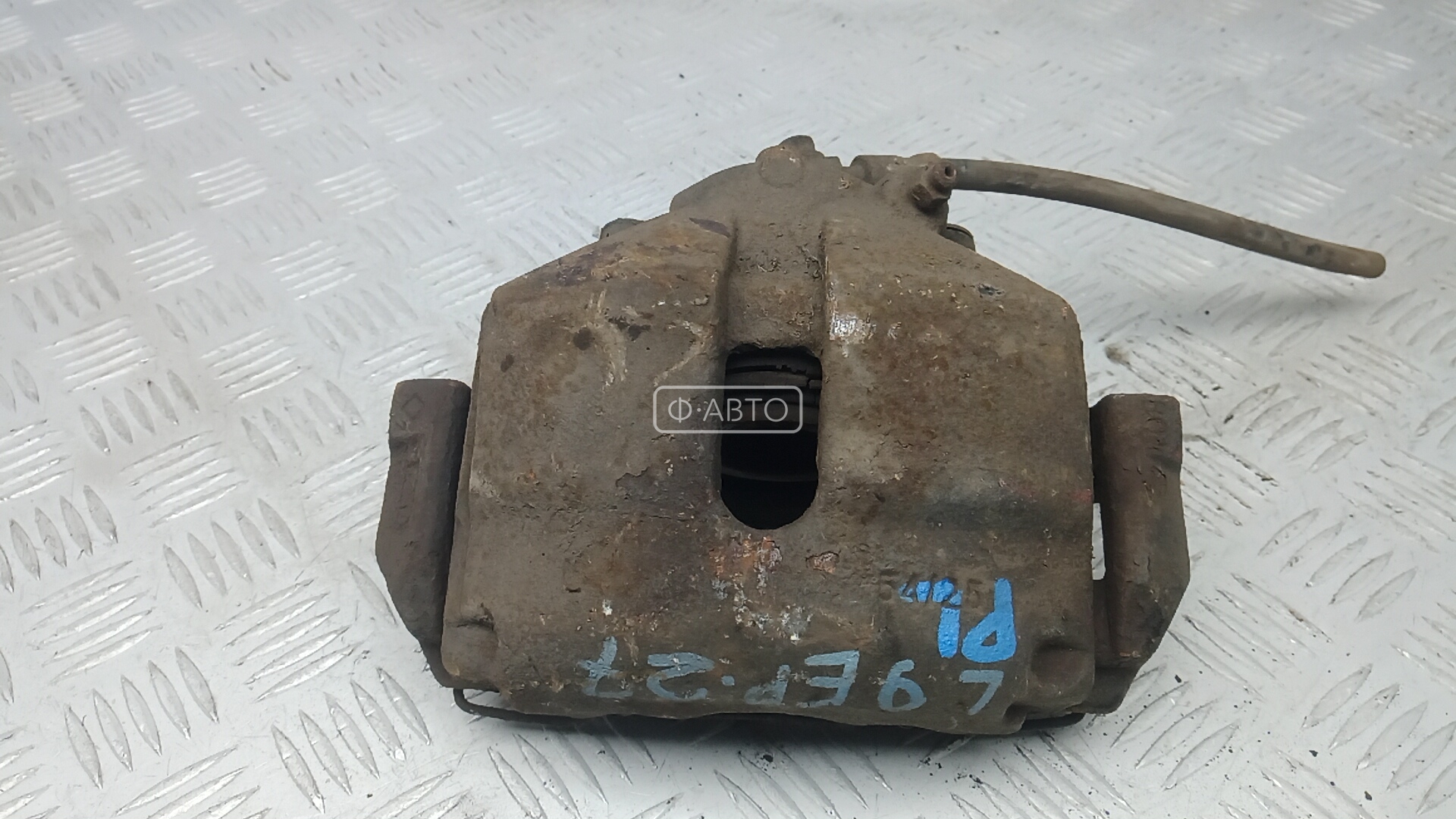 Суппорт тормозной передний левый