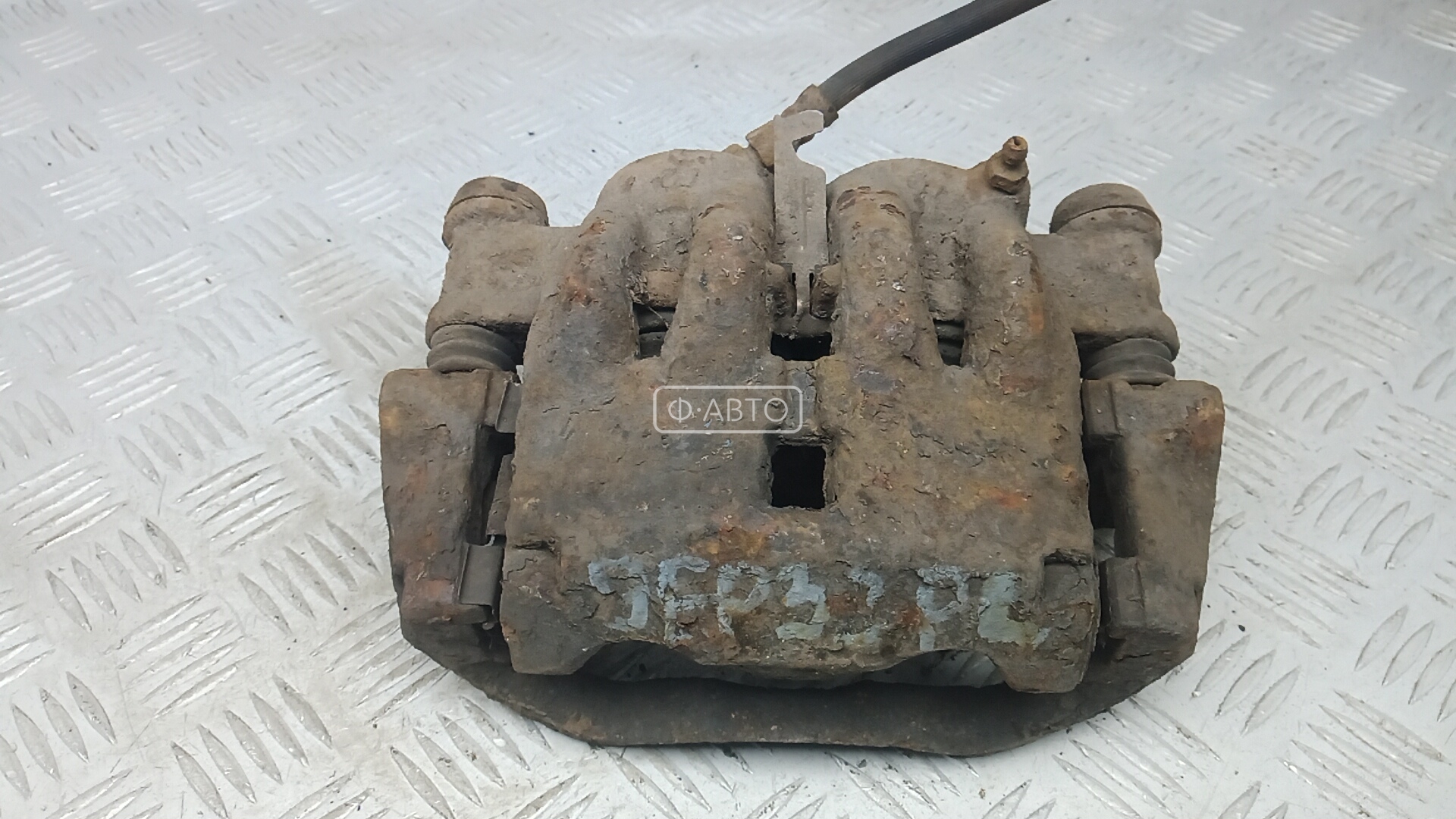 Суппорт тормозной передний левый