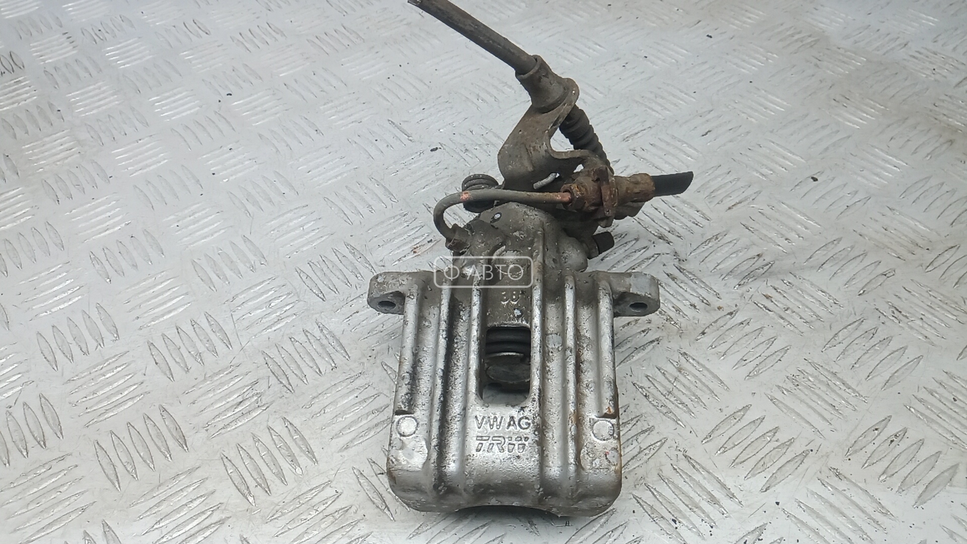 Суппорт тормозной задний левый